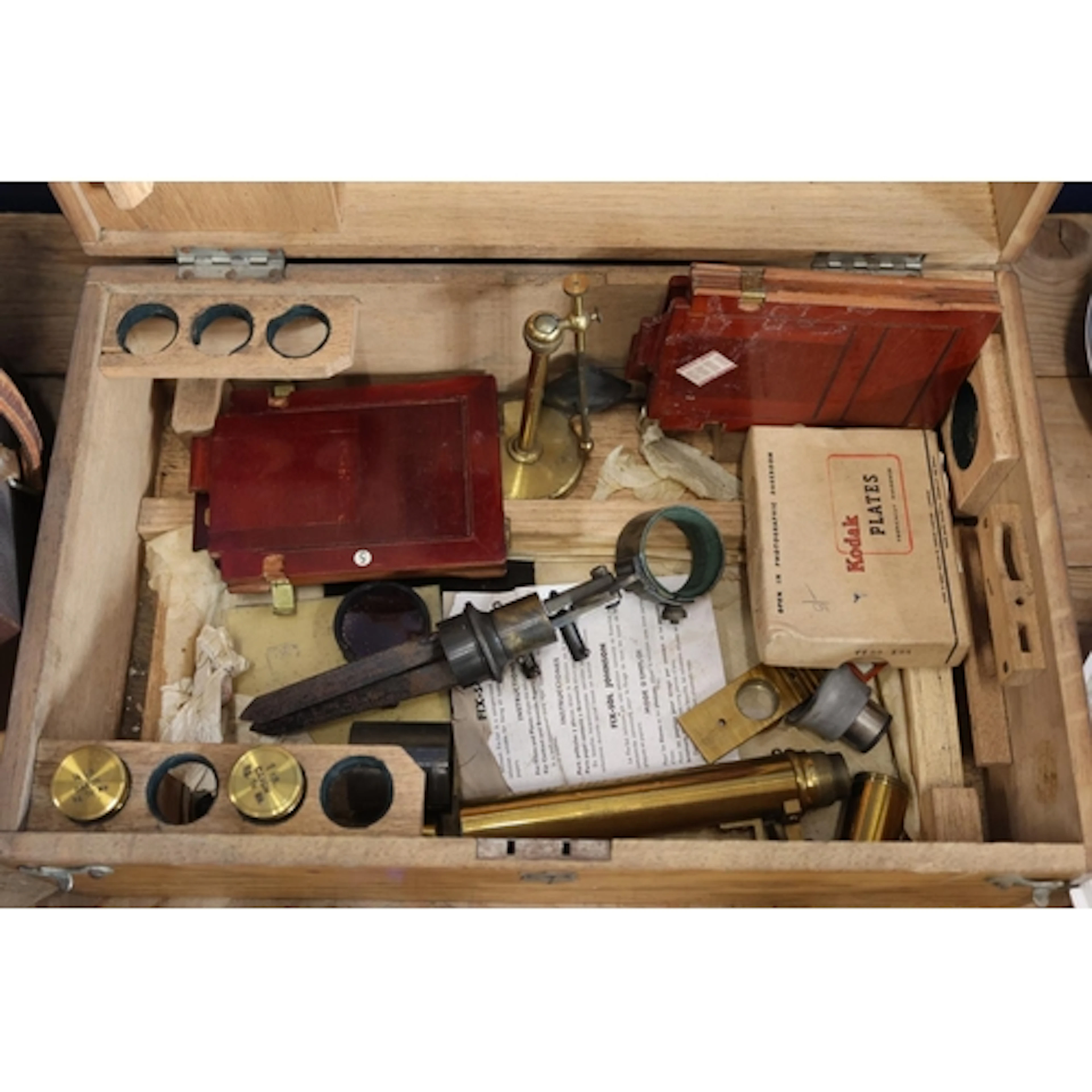Photographic equipment in wooden box.