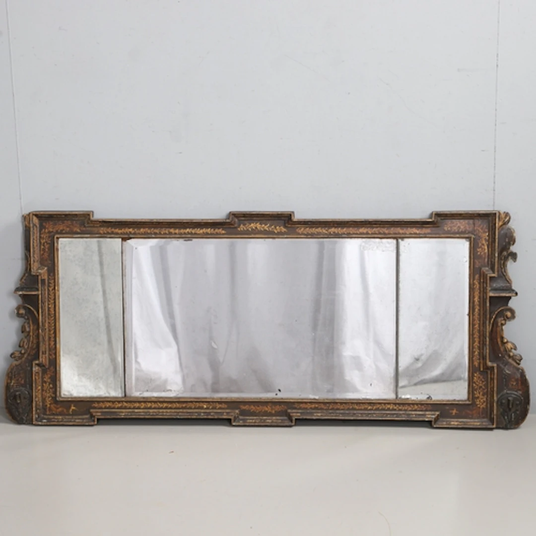 A GEORGE II EBONISED & GILT LANDSCAPE MIRROR. the bevelled t...
