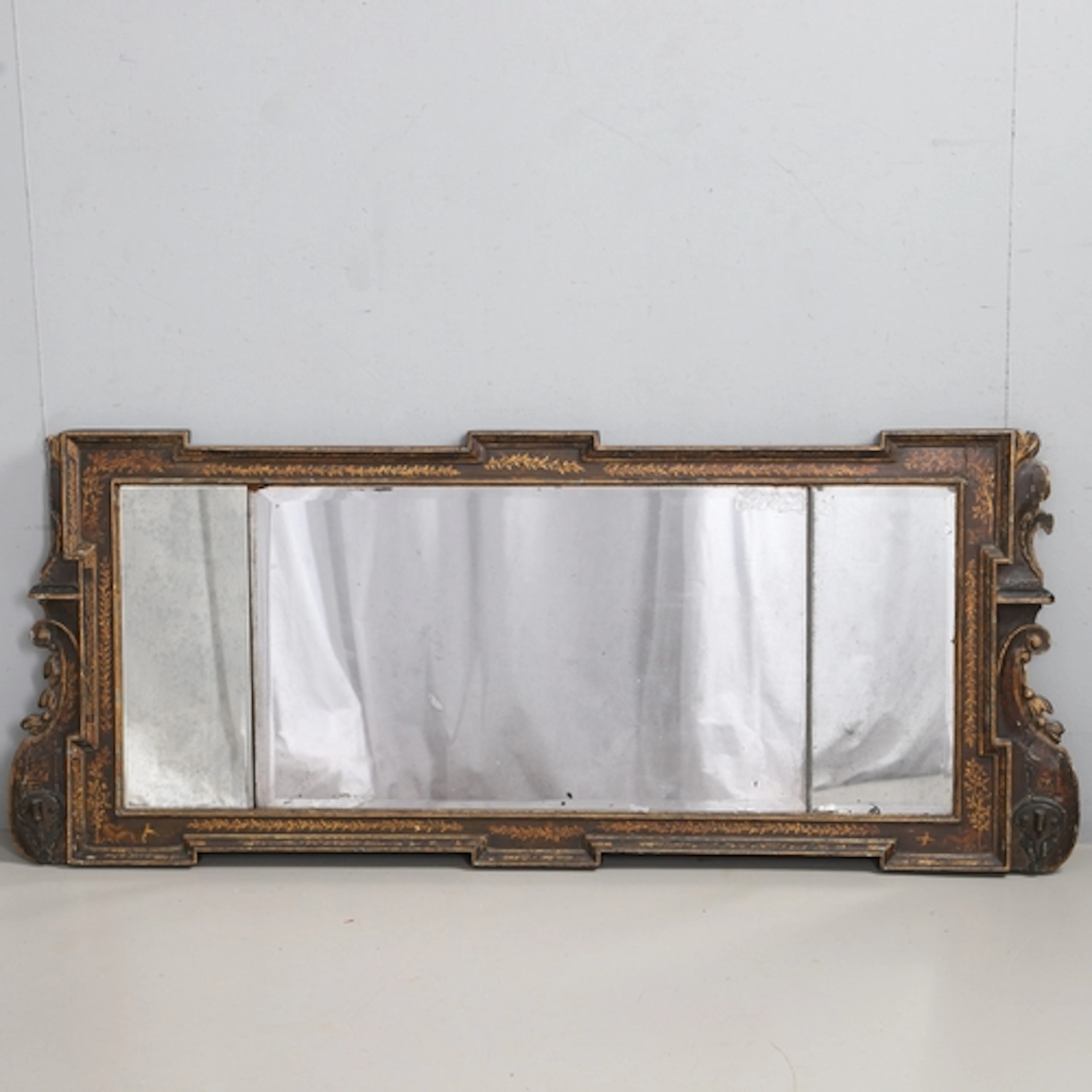 A GEORGE II EBONISED & GILT LANDSCAPE MIRROR. the bevelled t...