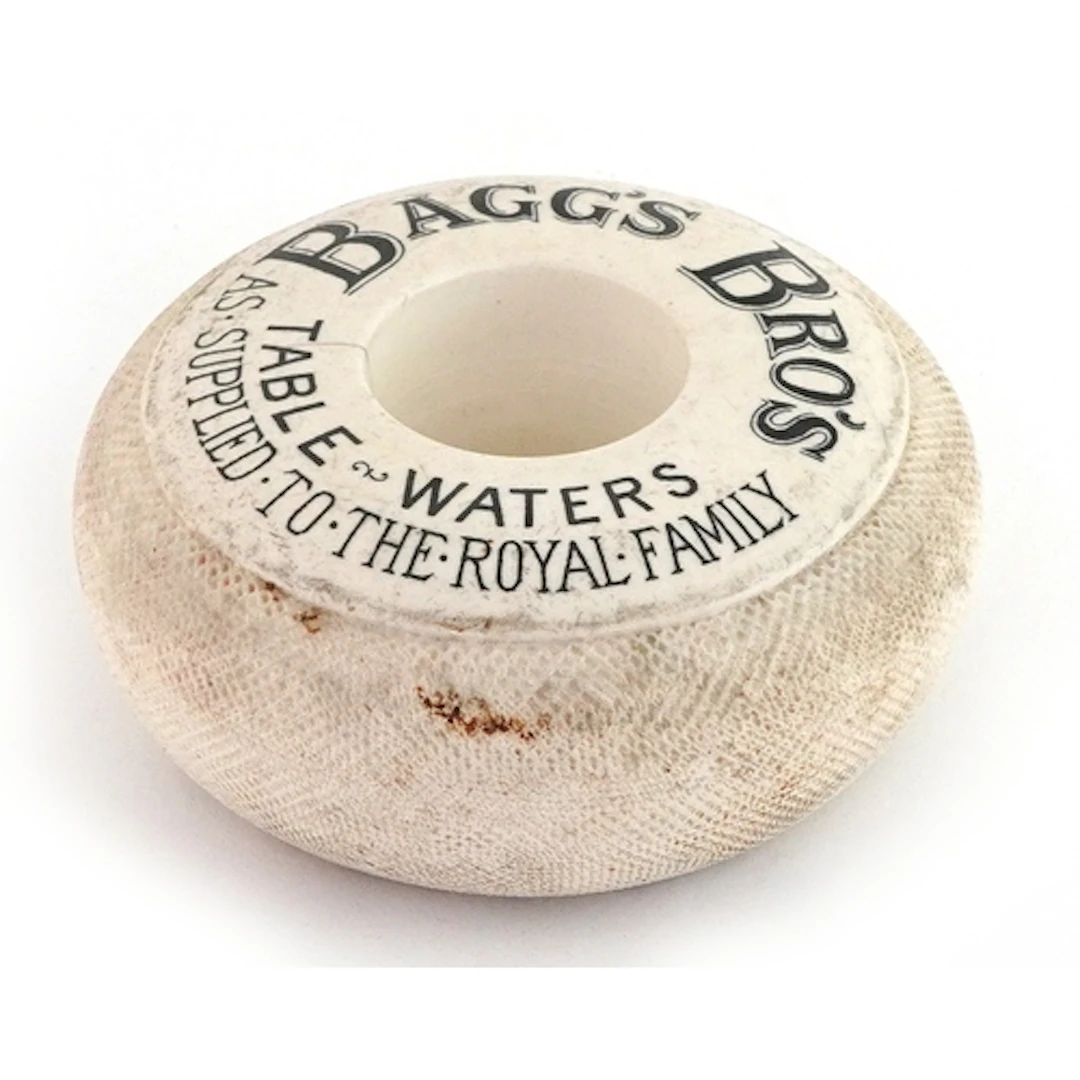Bagg's Bros' Table Waters advertising porcelain match strike...