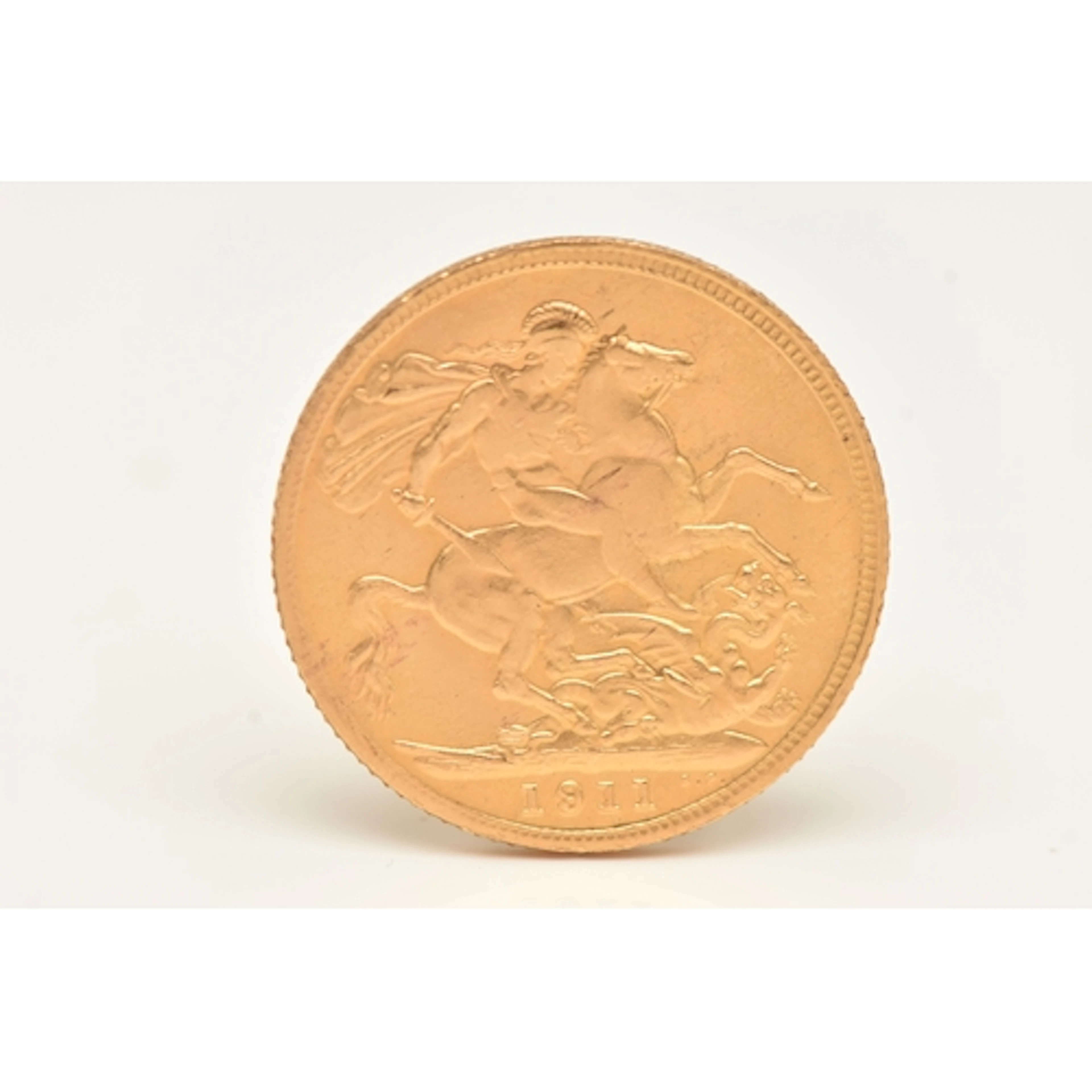 A GEORGE V FULL GOLD SOVEREIGN COIN, dated 1911, approximate...