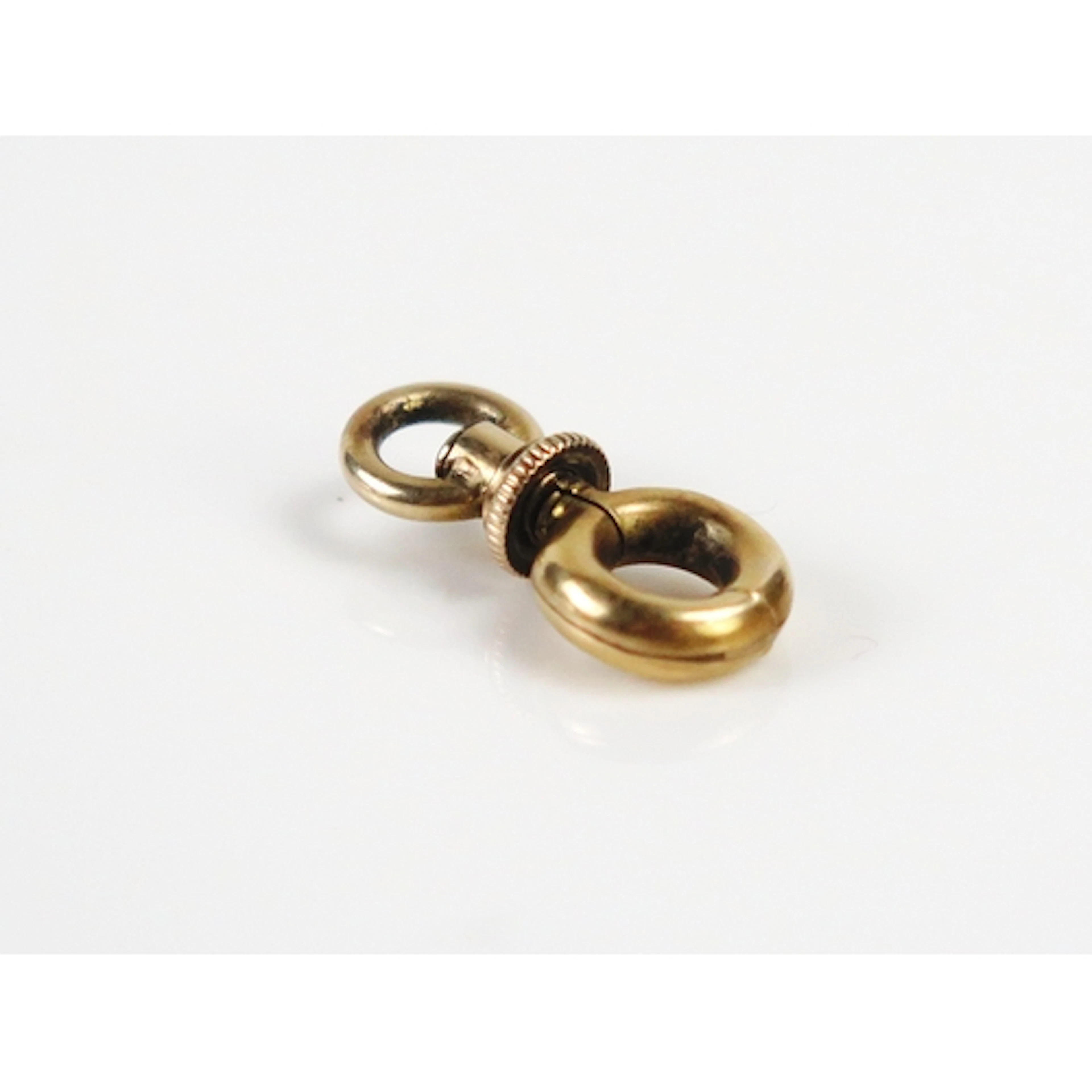 An antique dog clip with screw down safety 'lock' in preciou...