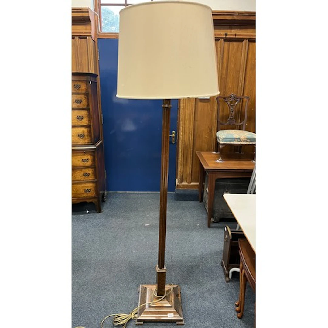 Mahogany standard floor lamp with shade.
