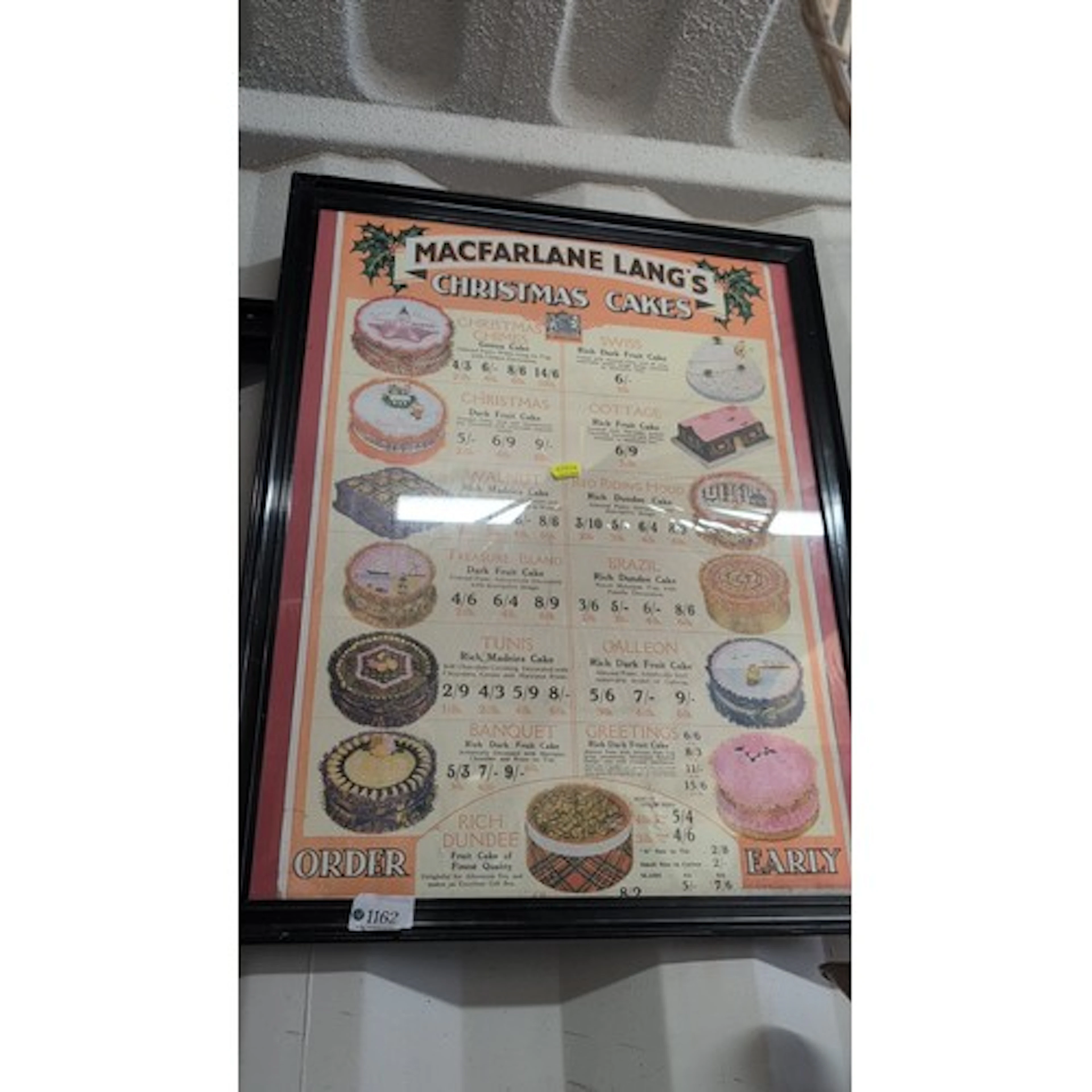 A framed vintage Macfarlane Lang’s “Christmas Cakes” illustr...