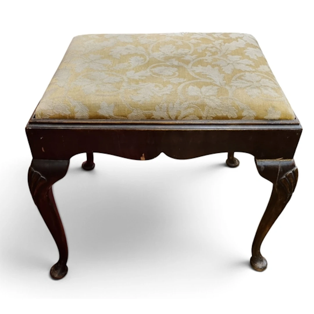 A late 19th Century Mahogany rectangular Stool with carved c...