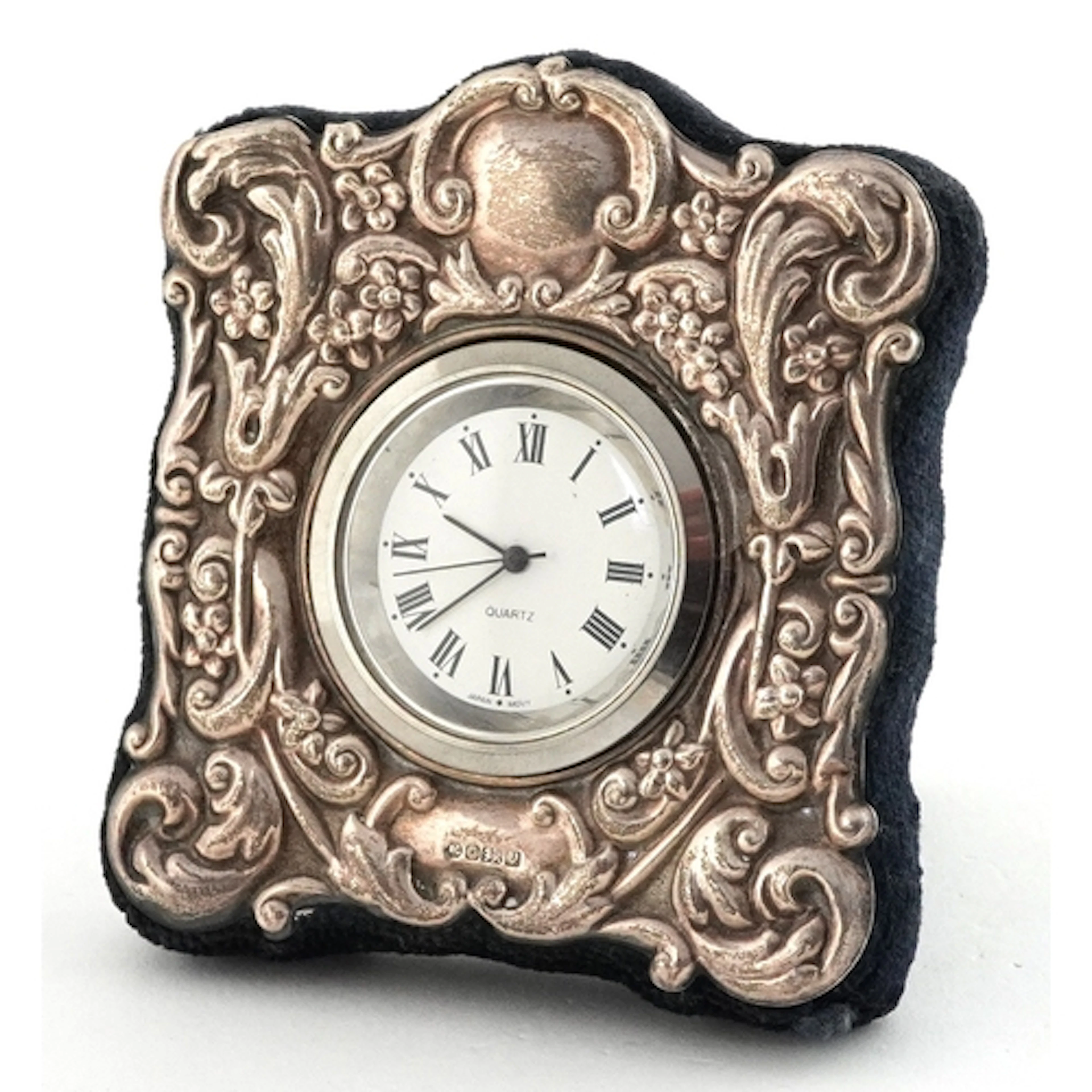 Carrs miniature silver easel clock embossed with flowers, Sh...