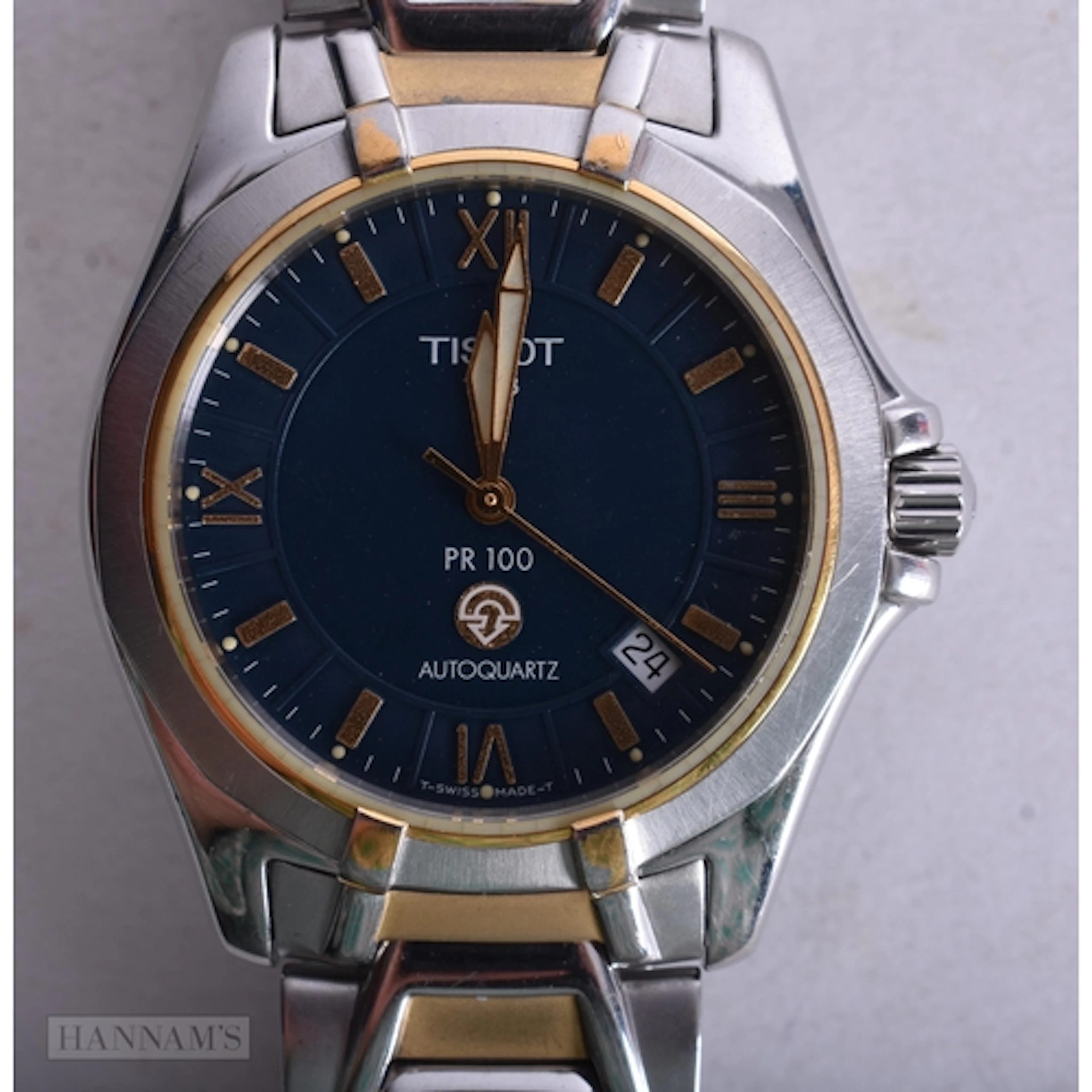 A TISSOT WRIST WATCH. Not running. 3.5 cm wide.