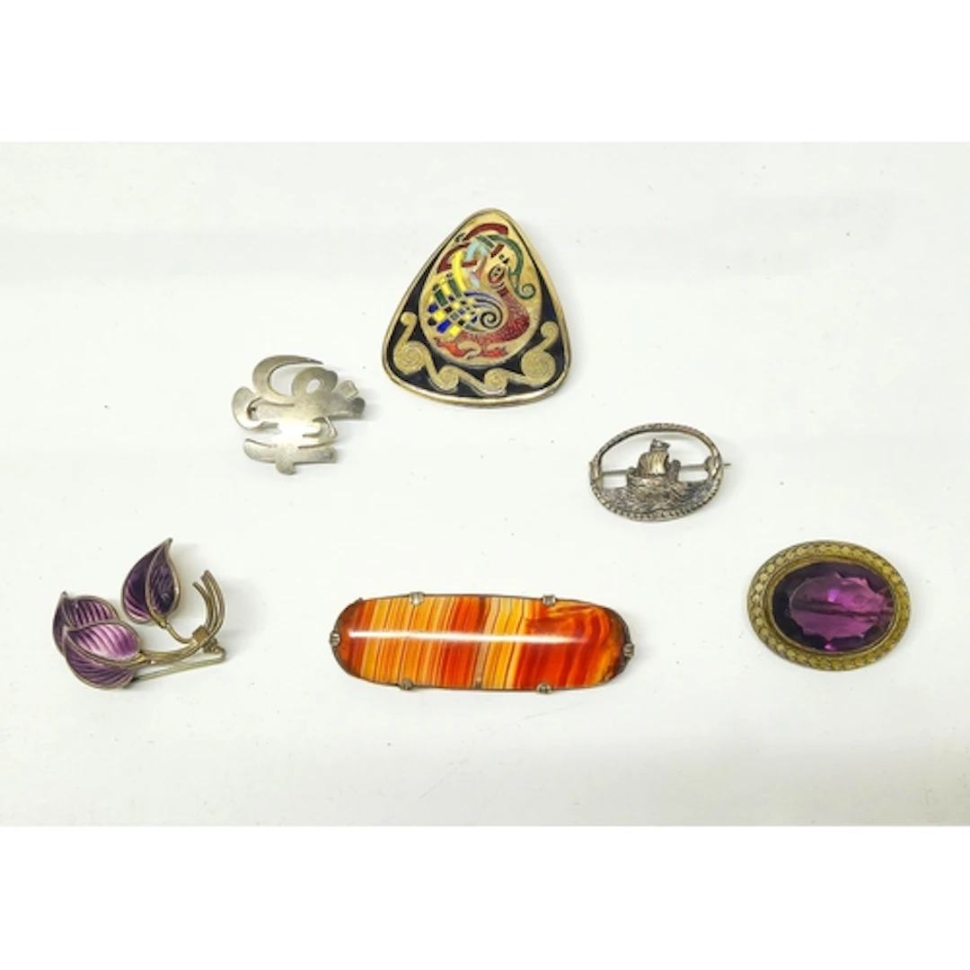 Group of silver and decorative brooches to include Norwegian...