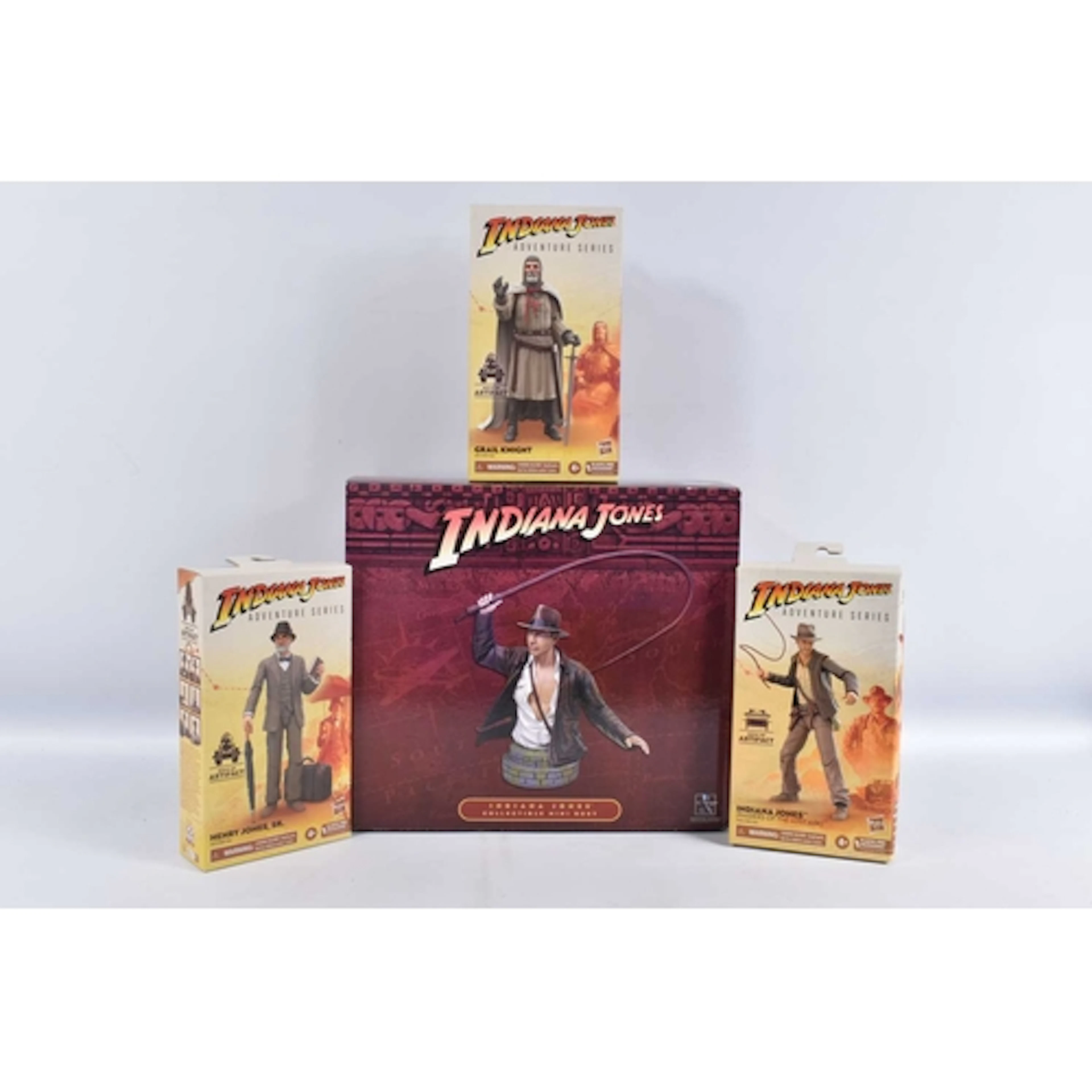 FOUR BOXED INDIANA JONES COLLECTABLE DISPLAY FIGURES, to inc...