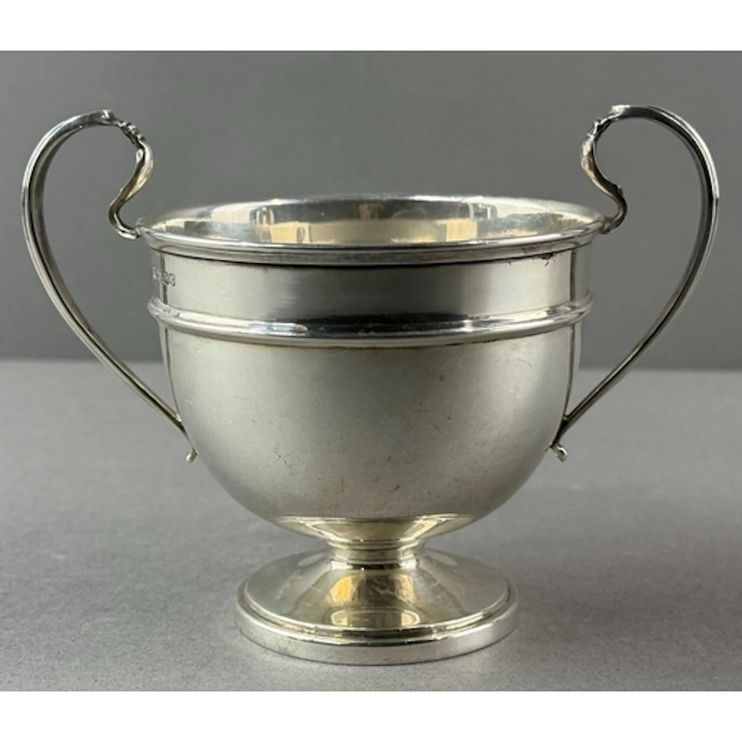 Silver: a George V sugar bowl by Emile Viner, Sheffield 1934...