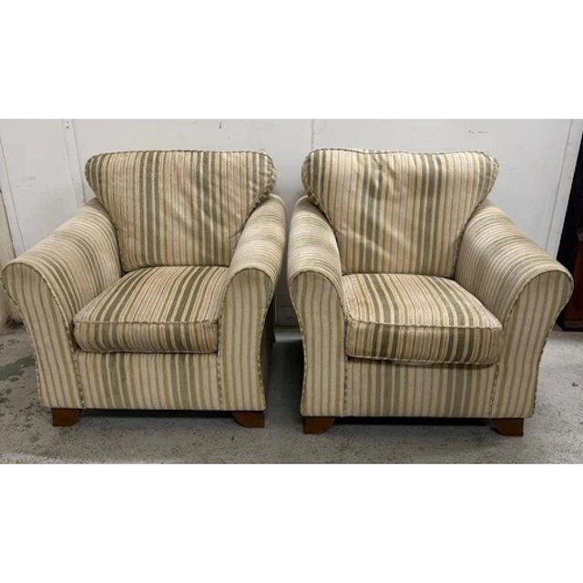A pair of Marks and Spencer cream and tan striped arm chairs...