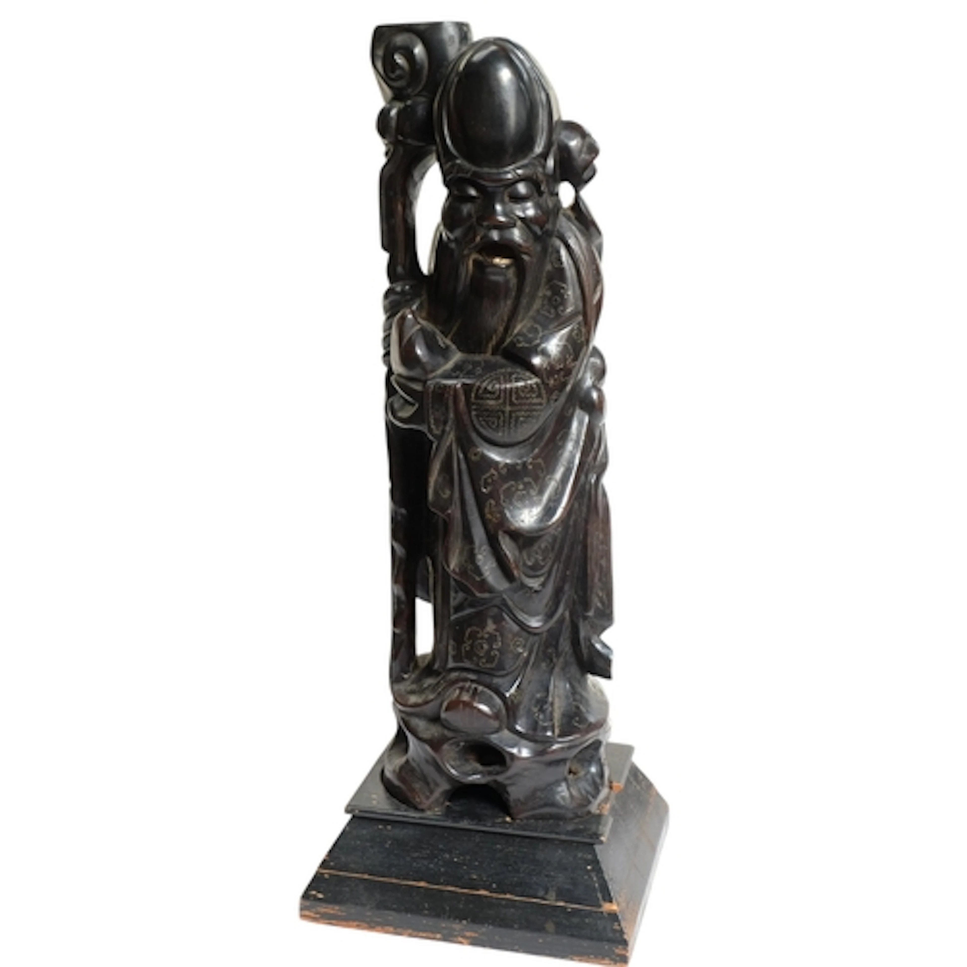 A large carved and ebonised wood Oriental sage figure, on a ...