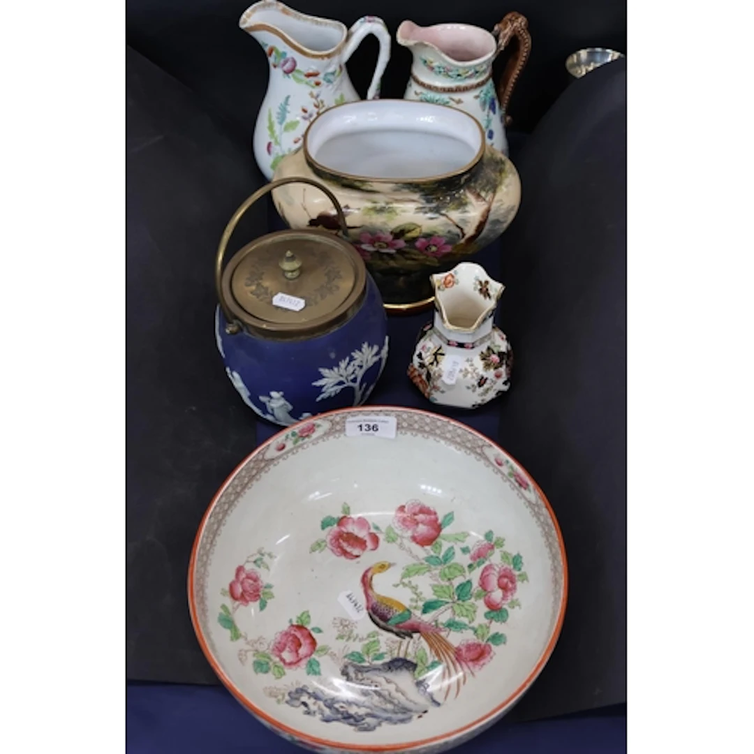 Ceramics including a rose bowl, a biscuit jar, water jugs an...