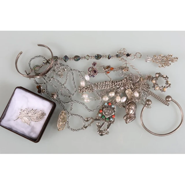 Silver and other costume jewellery to include a paua shell b...