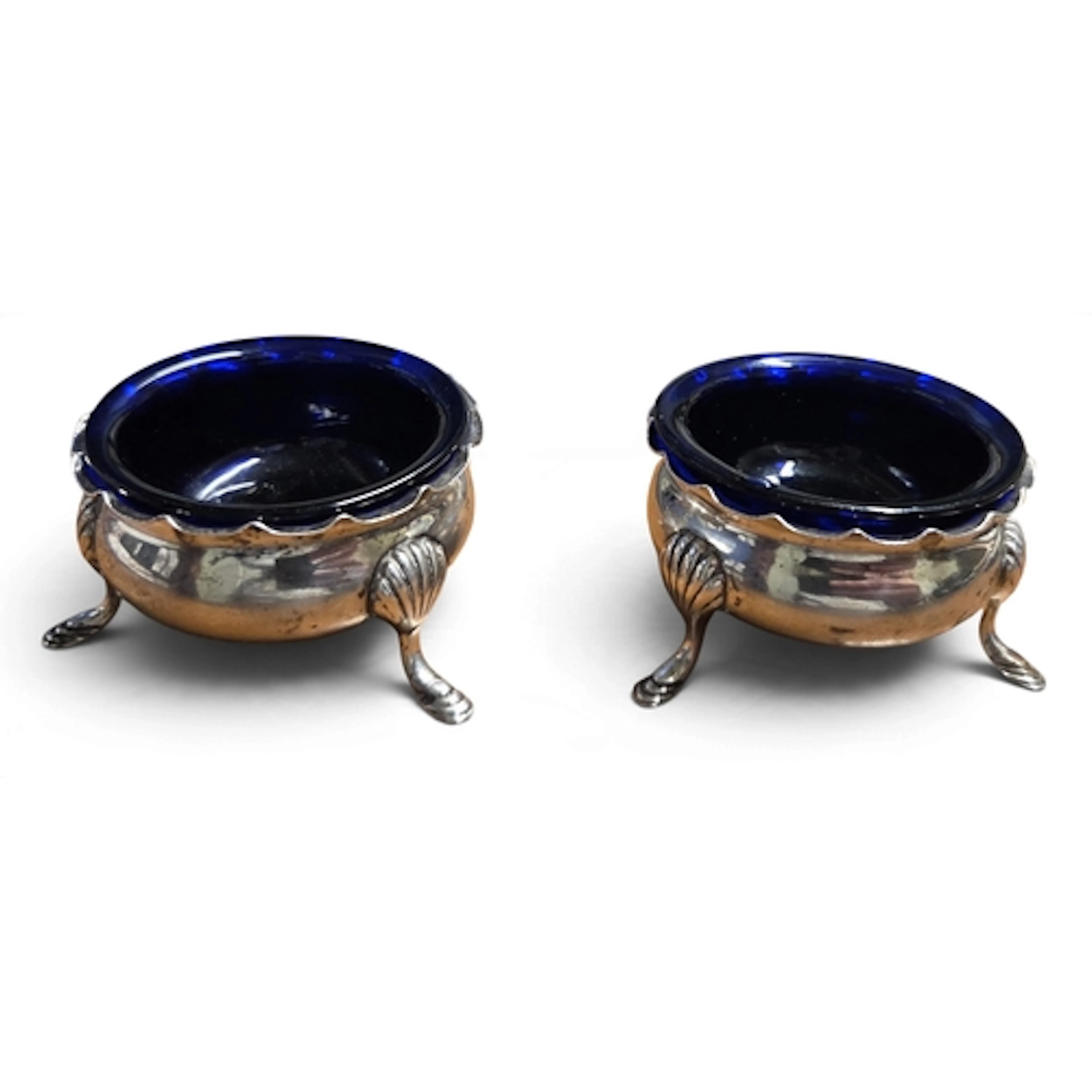 A god pair of Birmingham Silver Salts with blue glass liners...