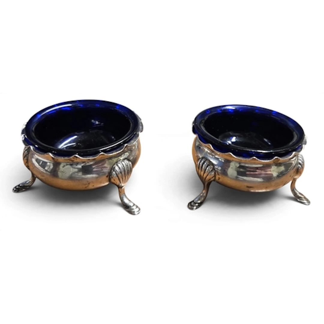 A god pair of Birmingham Silver Salts with blue glass liners...