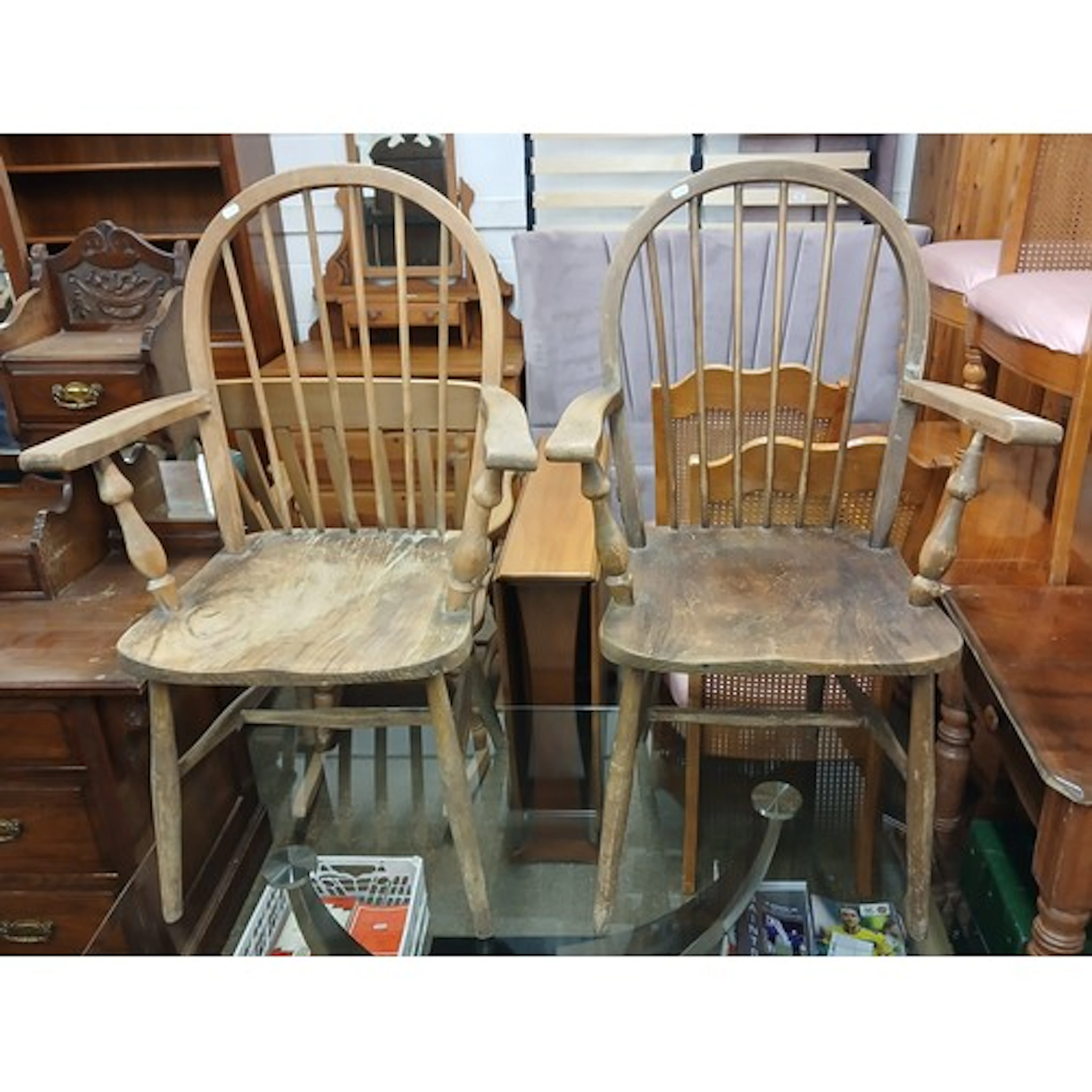 Pair of spindle back carved kitchen chairs.