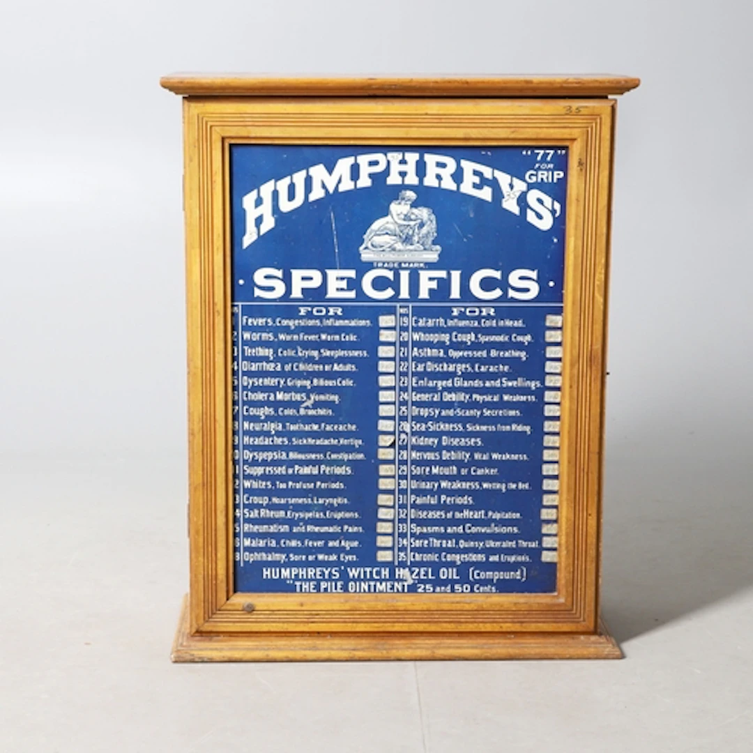 HUMPHREYS' SPECIFICS - APOTHECARY CABINET & CONTENTS. A pine...