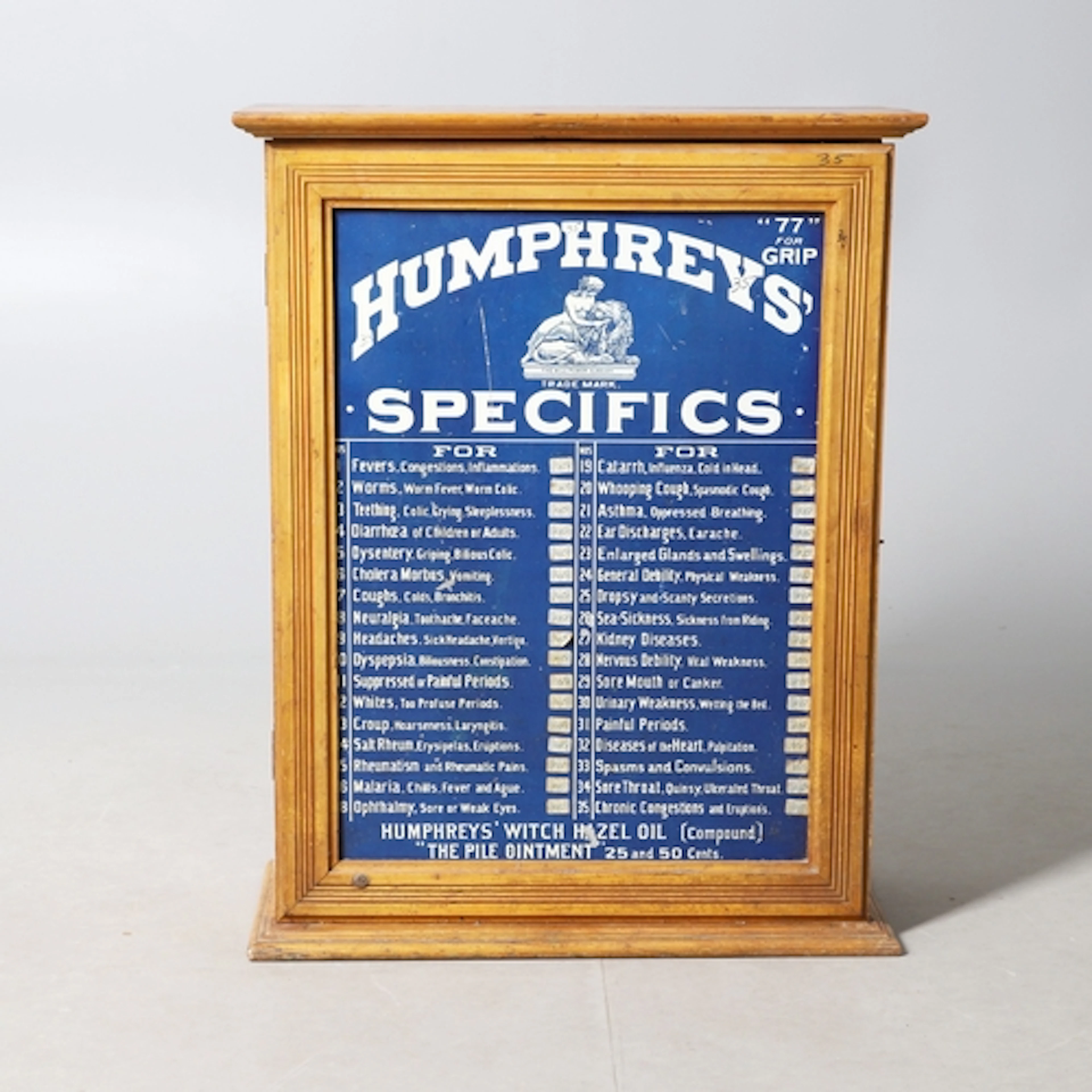 HUMPHREYS' SPECIFICS - APOTHECARY CABINET & CONTENTS. A pine...