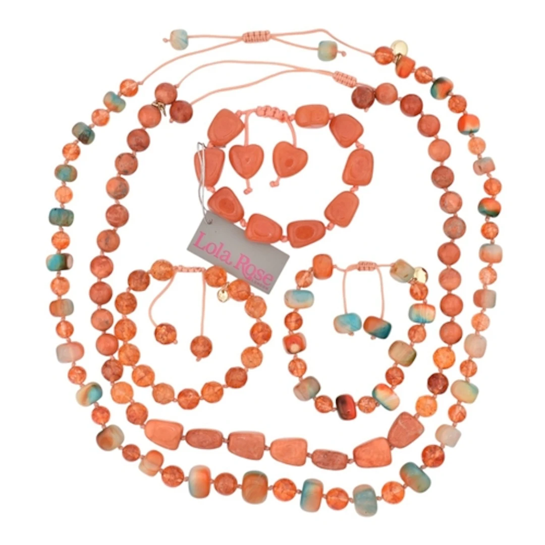 A selection of orange Lola Rose jewellery. Five pieces to in...