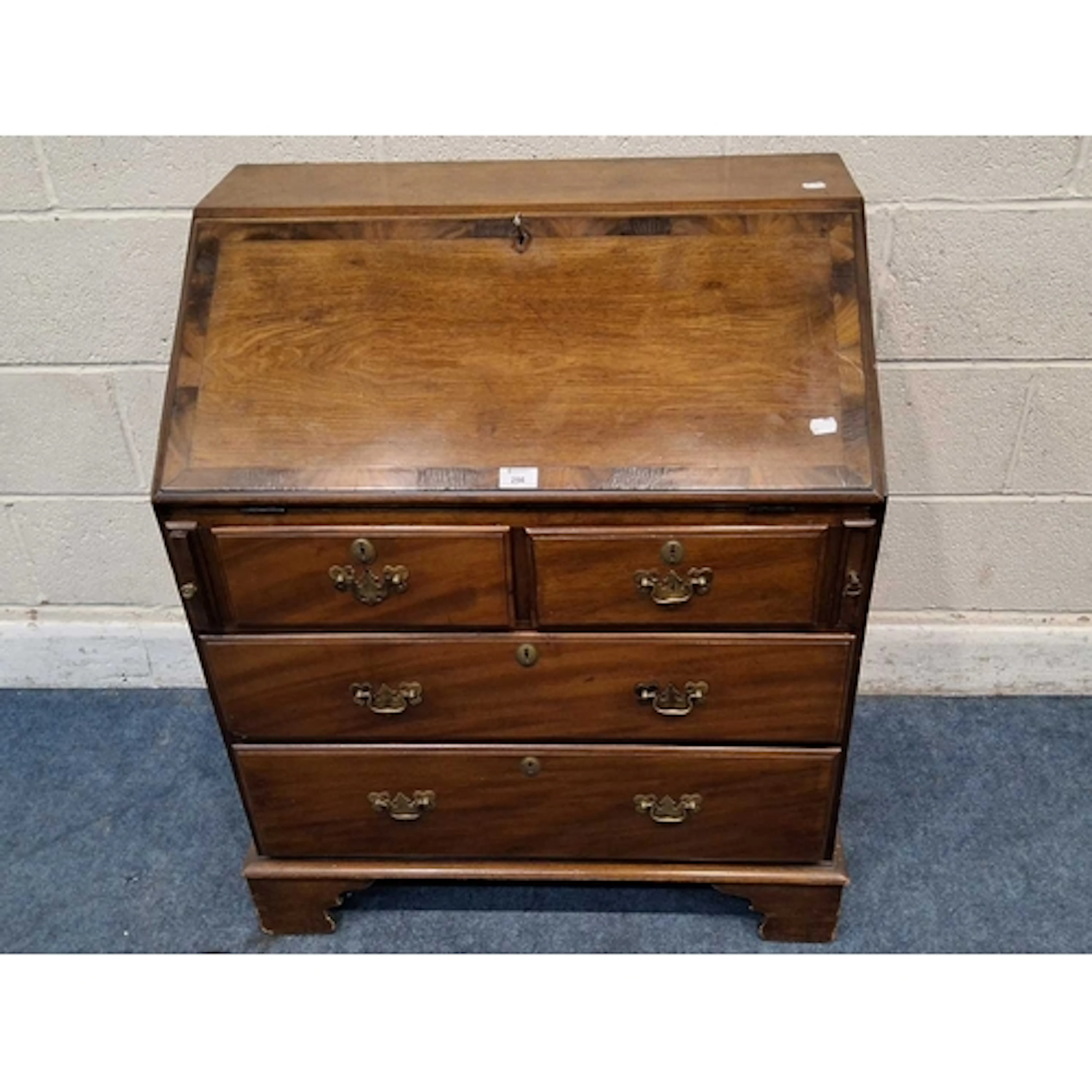 A REPRODUCTION BUREAU, the fall front door enclosing a fitte...