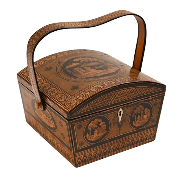 An English penwork sewing box, c1820, the swing handle with ...