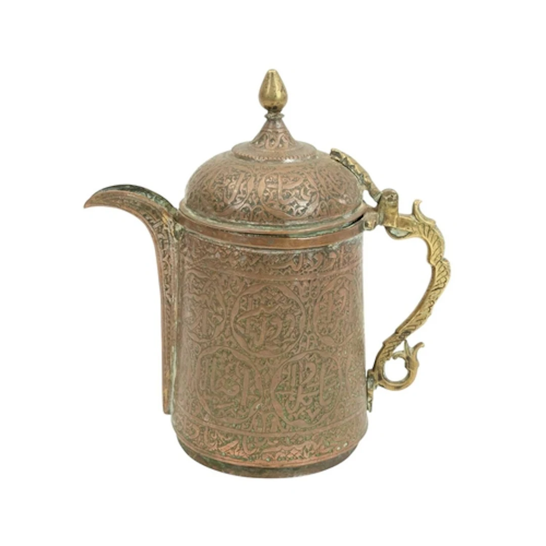 A Kashmiri engraved copper ewer or coffee pot. 19th century,...