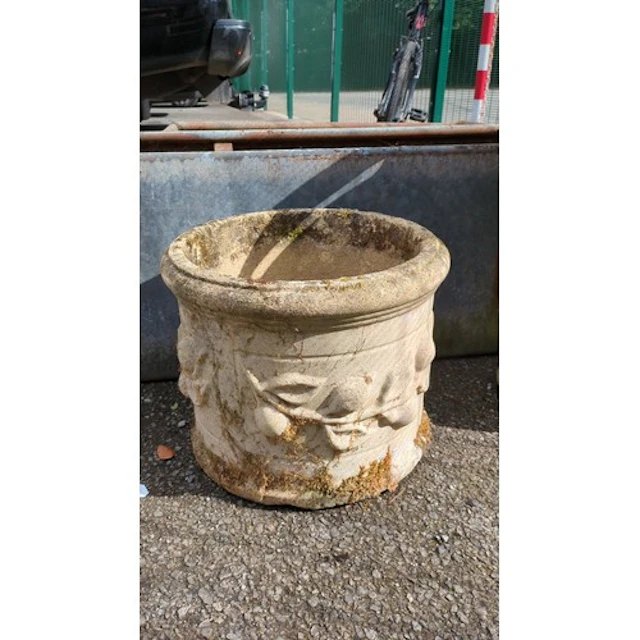 Cast stone garden jardinière of circular, tapering form with...