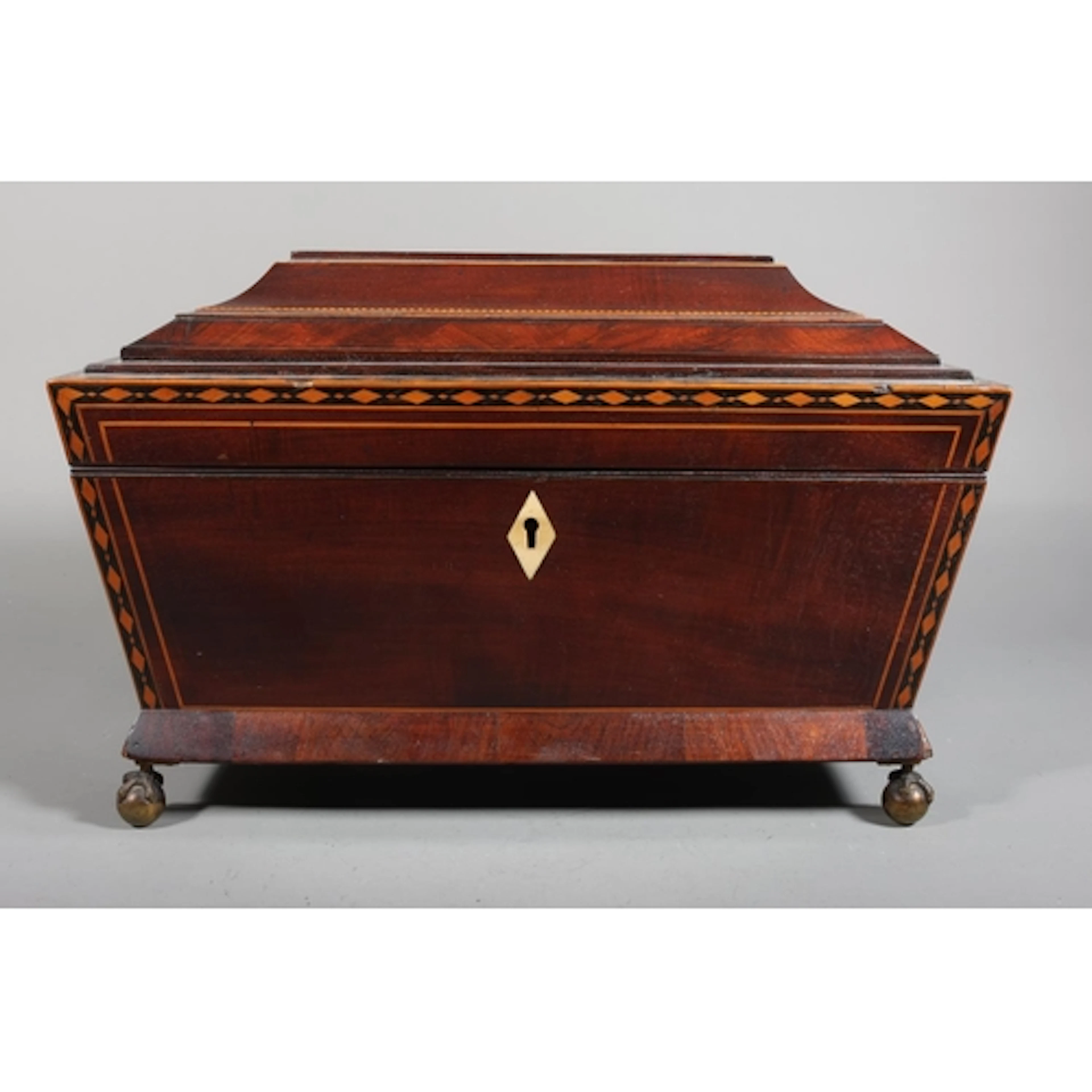 Antique mahogany tea caddy of large proportions, sarcophagus...