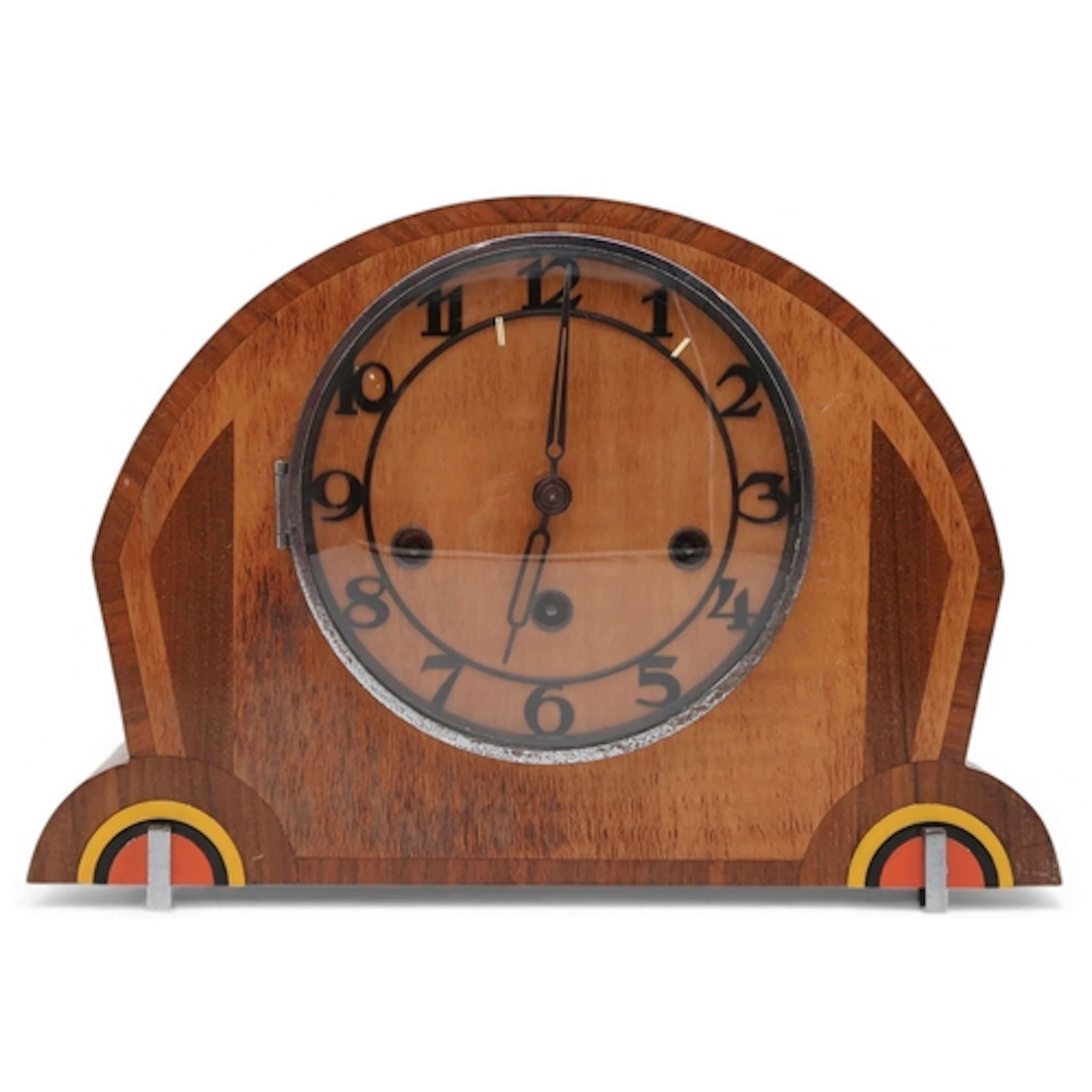 A striking vintage Art Deco mantel clock with a multi-veneer...
