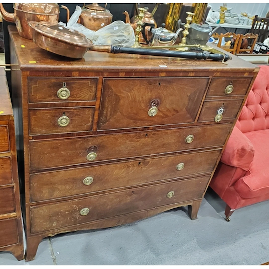 A large Chest of Drawers fitted five smaller drawers above t...