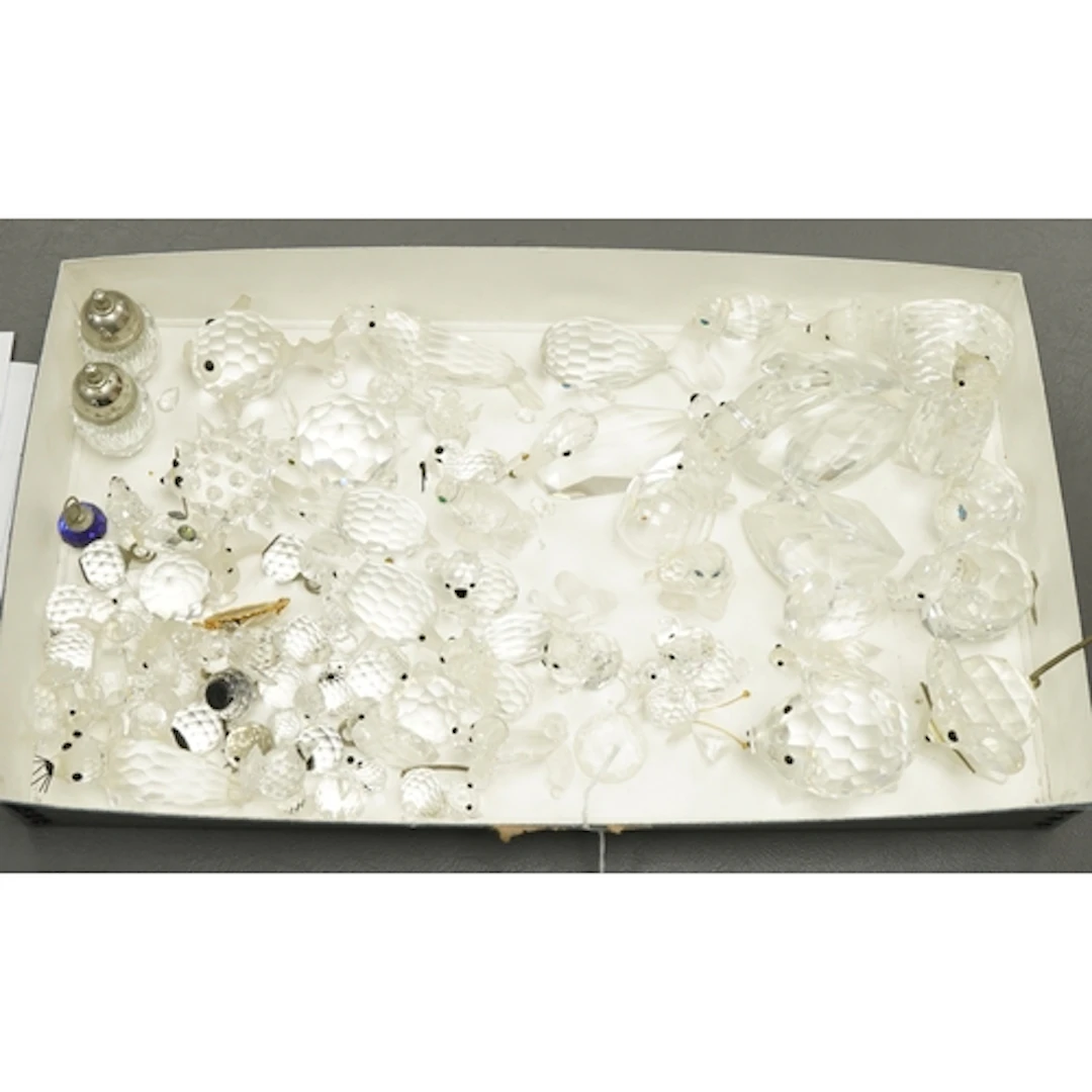 A quantity of Swarovski crystal animal figures to include to...