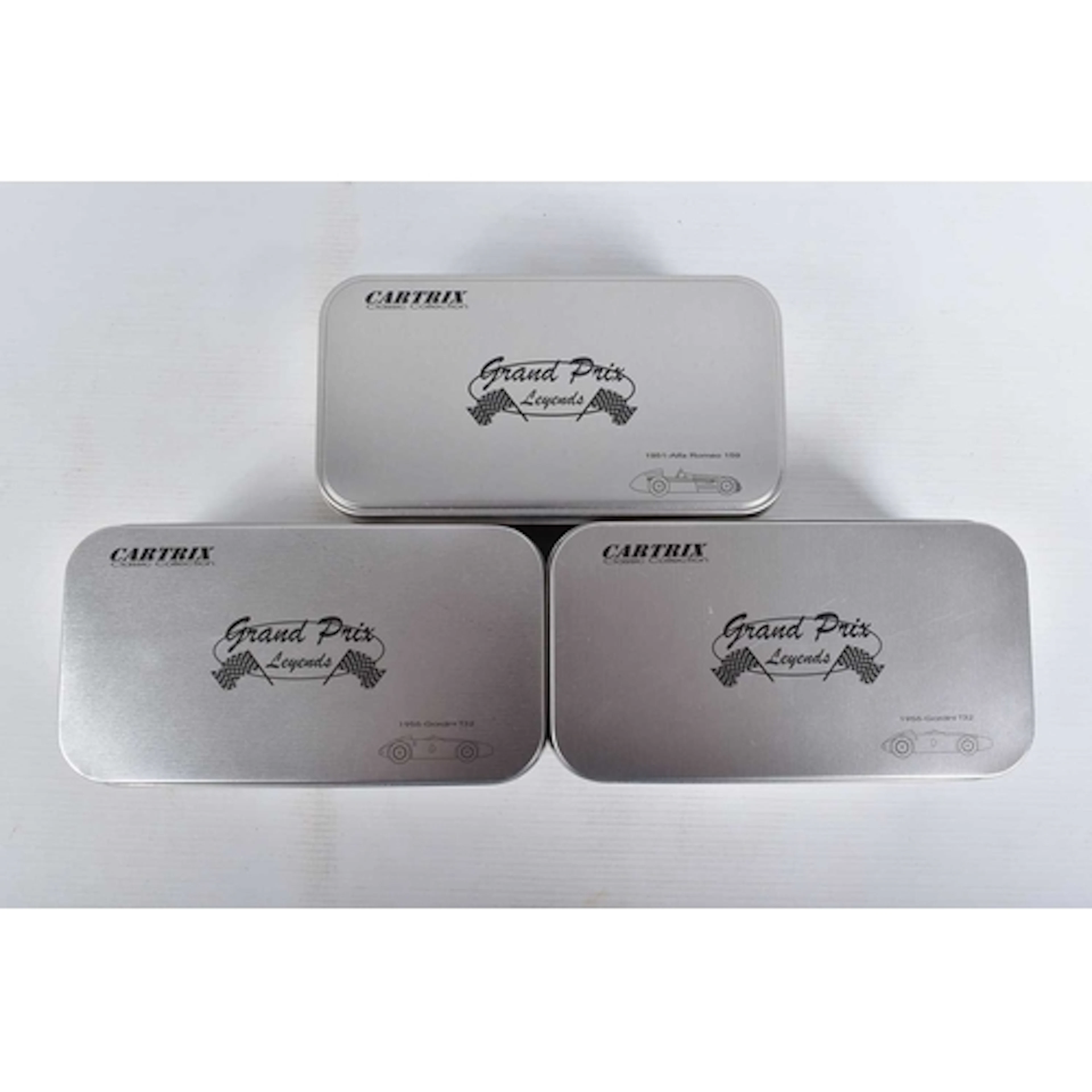 THREE CARTRIX GRAND PRIX LEGENDS SLOT CAR MODEL VEHICLES, to...