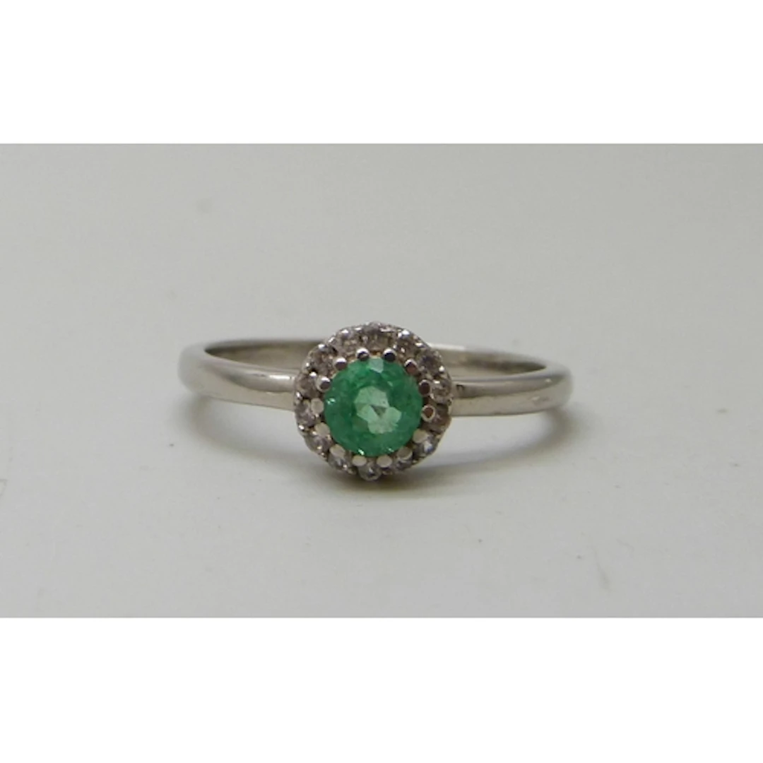 A Gemporia silver, emerald and white stone cluster ring, N/O