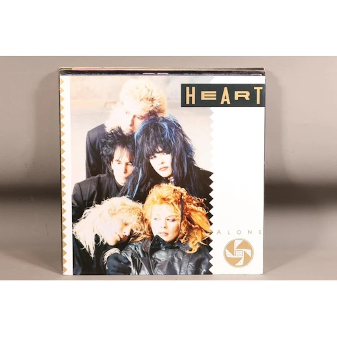 Heart vinyl records and 12'' singles to include Who Will You...
