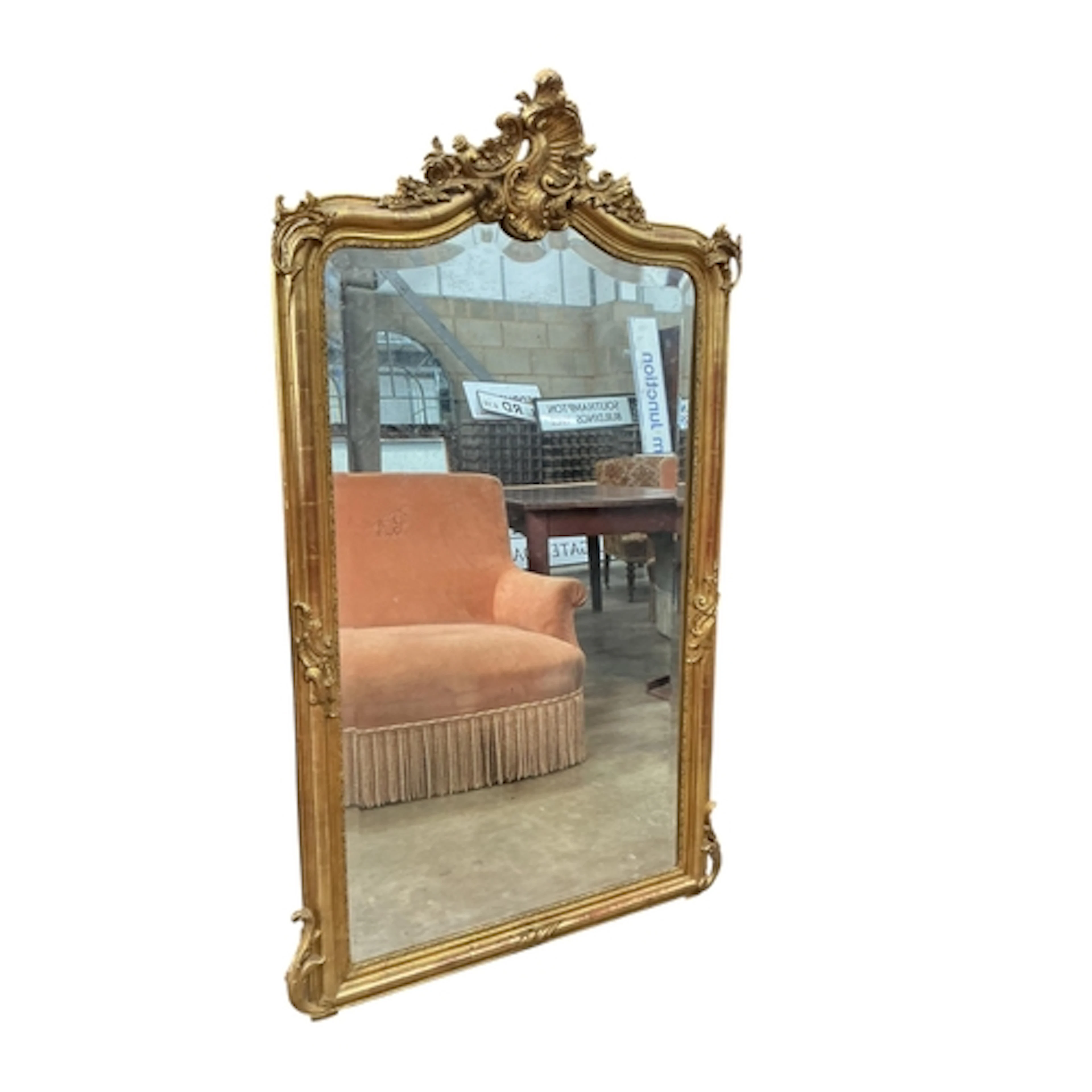 A 19th century Louis XV style giltwood and composition overm...