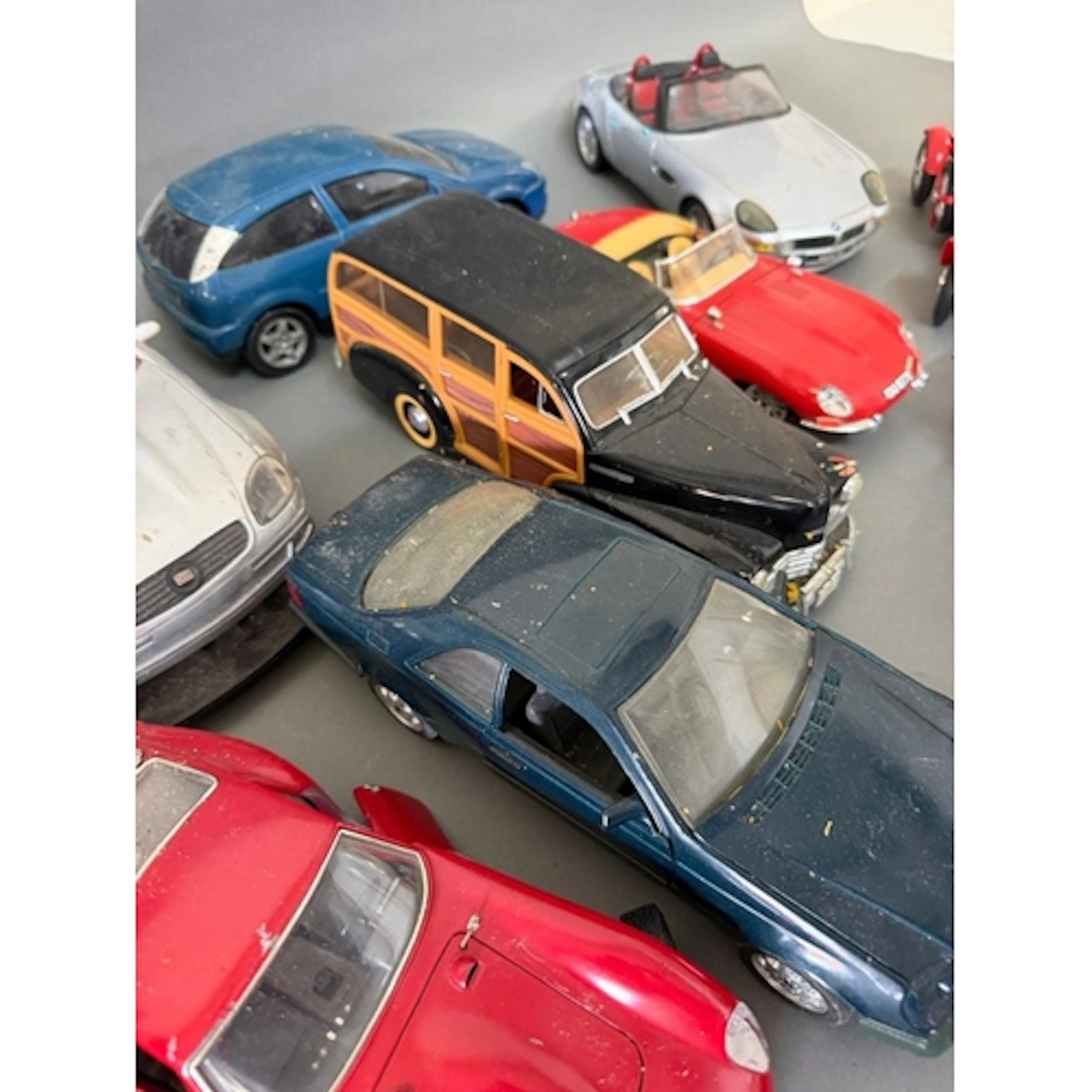 A selection of diecast cars to include Bugatti, Ferrari and ...