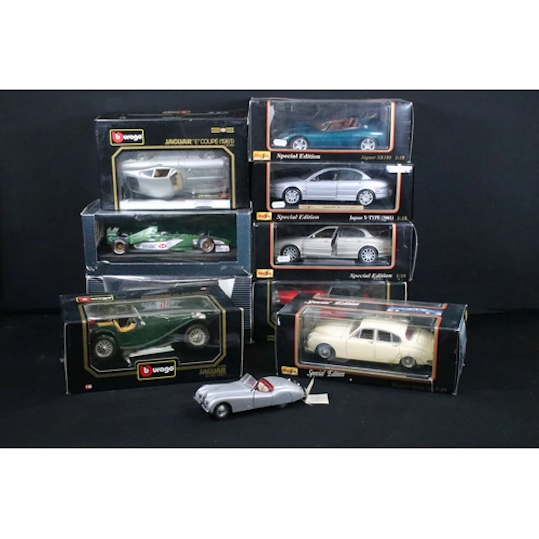 Nine boxed 1/18 scale diecast models to include Hot Wheels R...