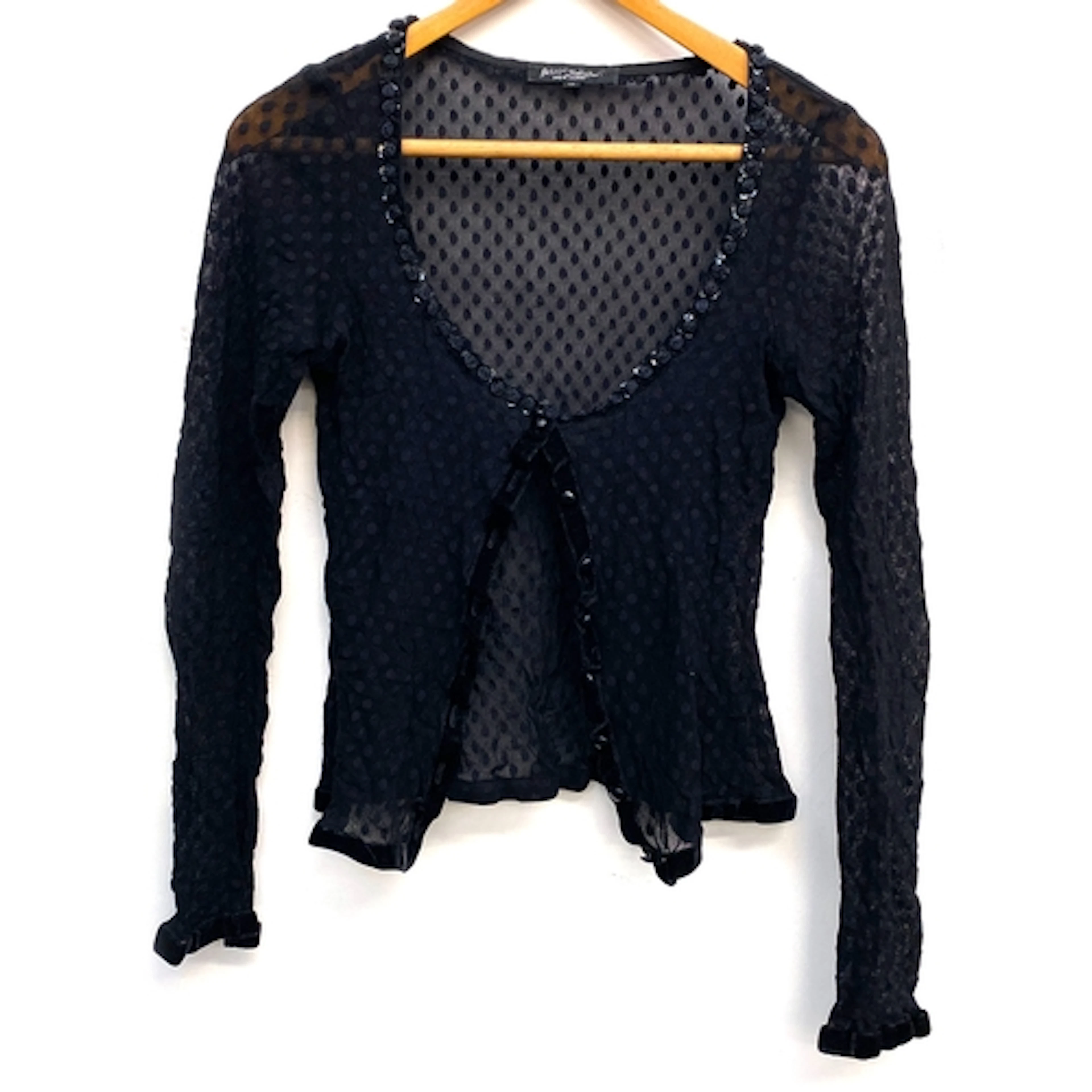 A Betsey Johnson black polka dot lace blouse with velvet tri...