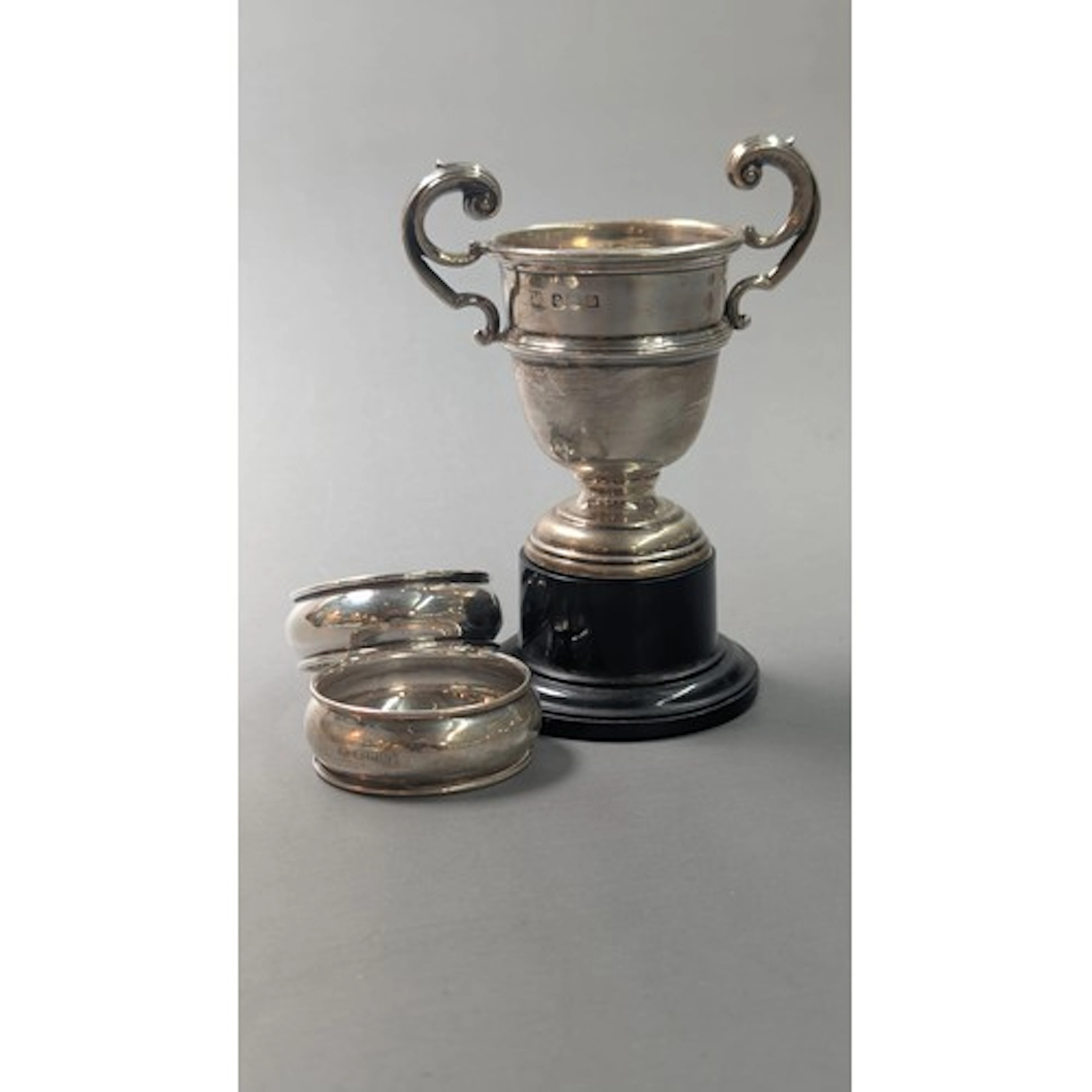 Small silver twin-handled trophy cup and a pair of silver&nb...