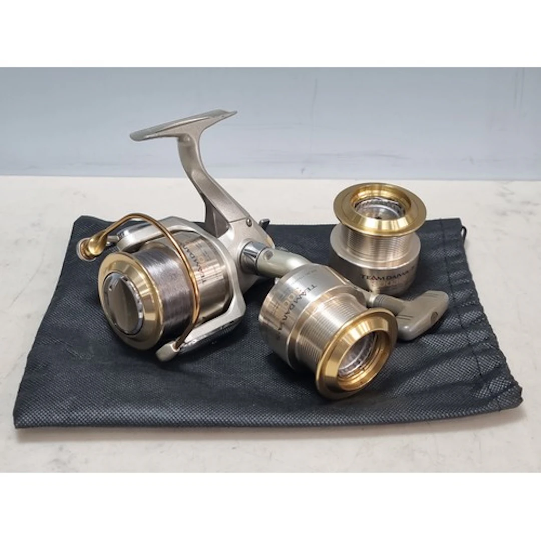A Team Daiwa - S 3003CU ABS Fixed spool Reel with two spare ...