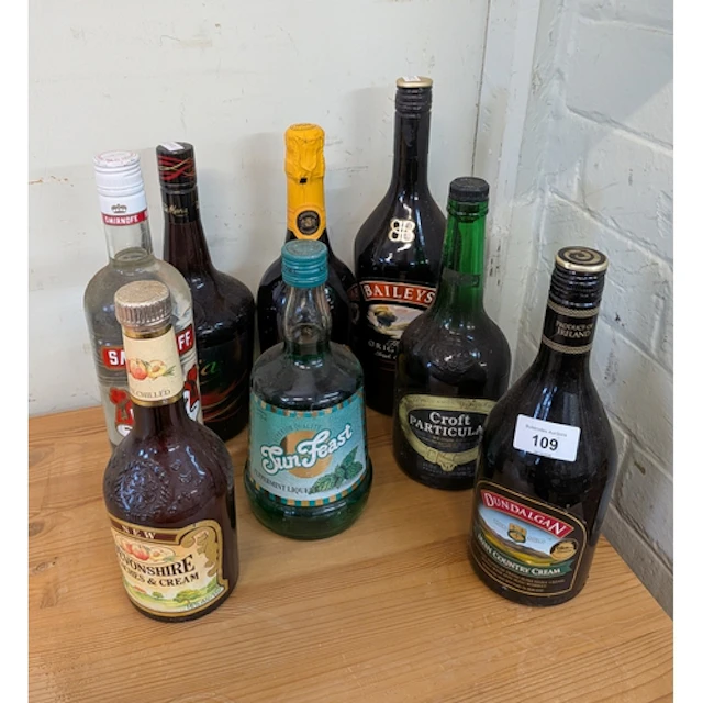 A bottle of Vodka together with Tia Maria, Bailey's Irish Cr...