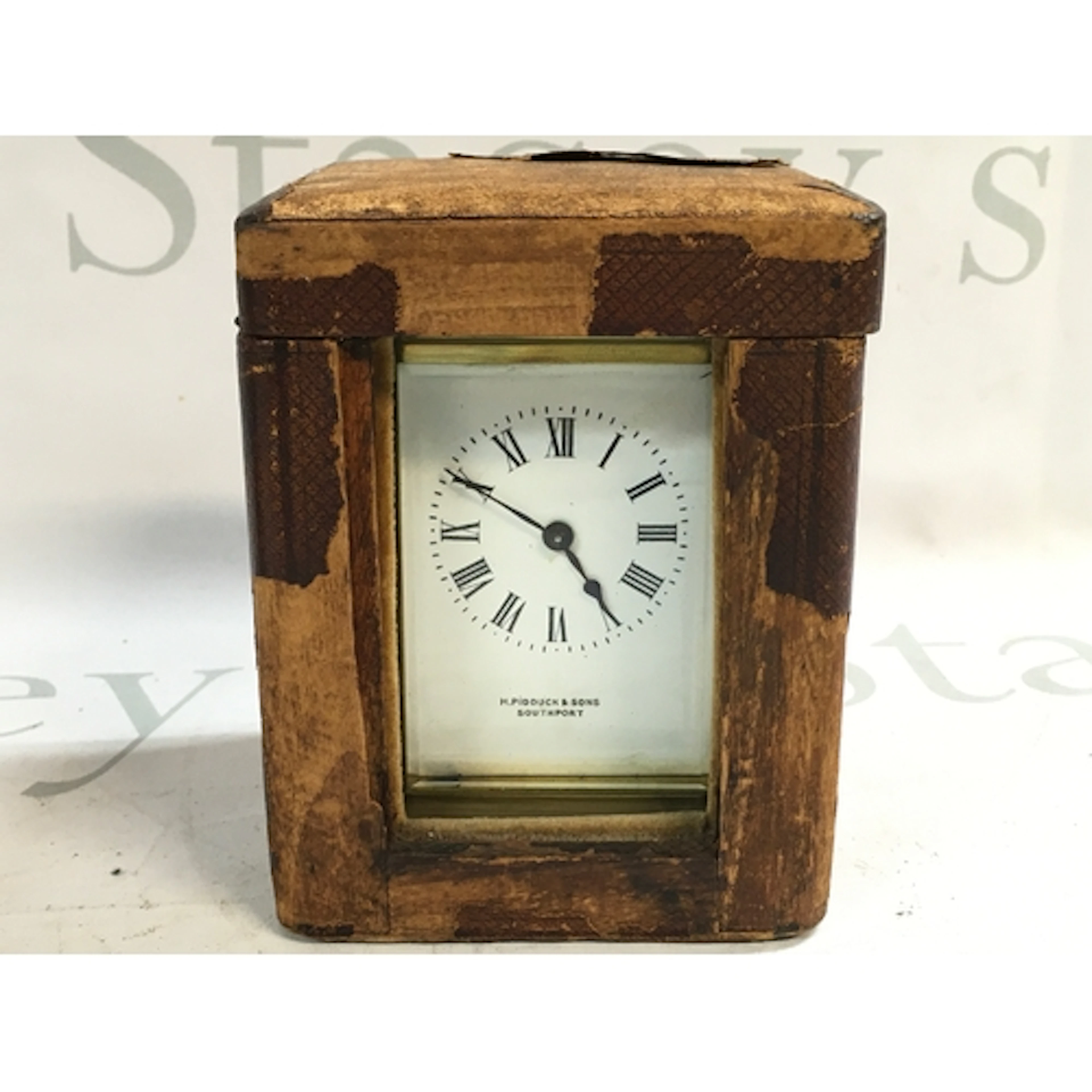 A brass cased carriage clock in a fitted case (not seen work...