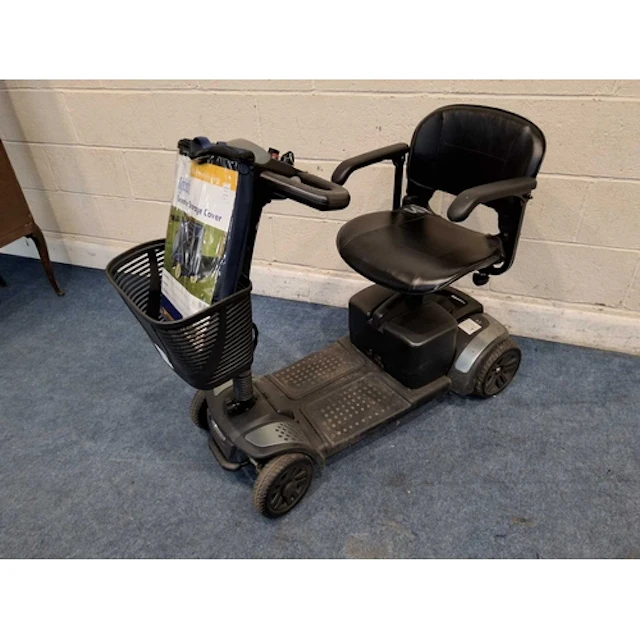 AN EXCEL VAN OS MOBILITY SCOOTER with charger, cover and one...