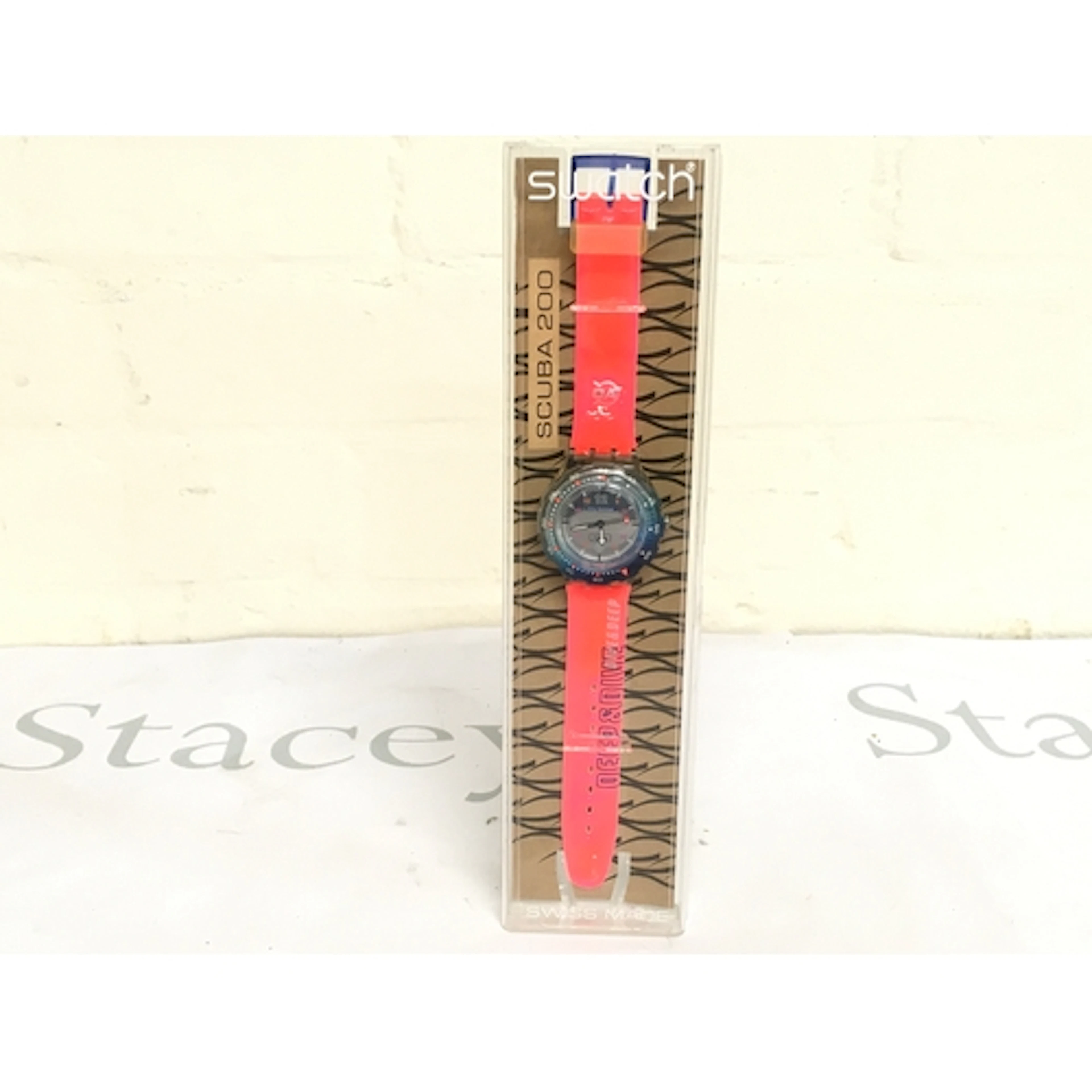 1999 Swatch Scuba 200 "Deep and Dive" (SDK134) watch. It fea...