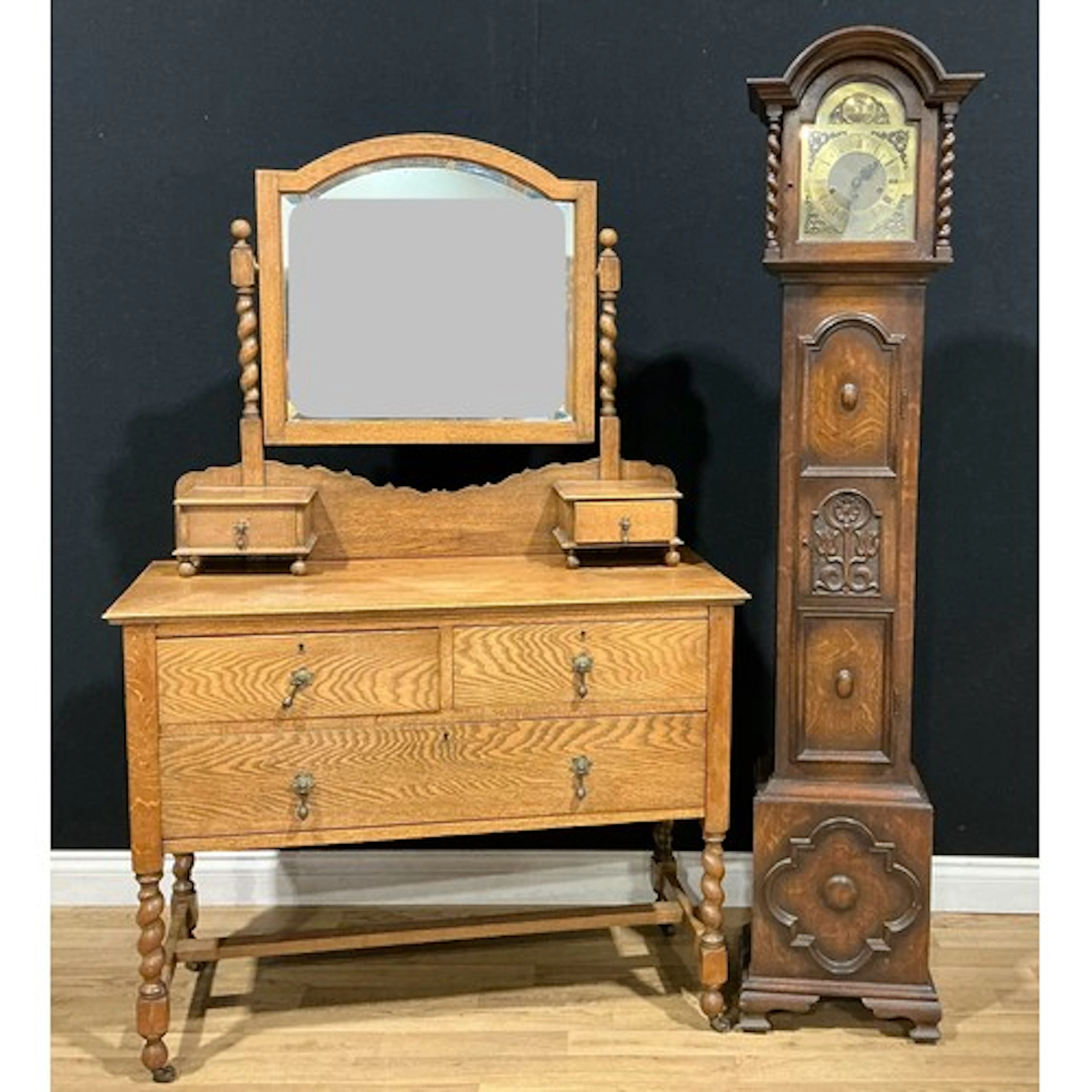 An early to mid-20th century oak dressing chest, 162cm high,...