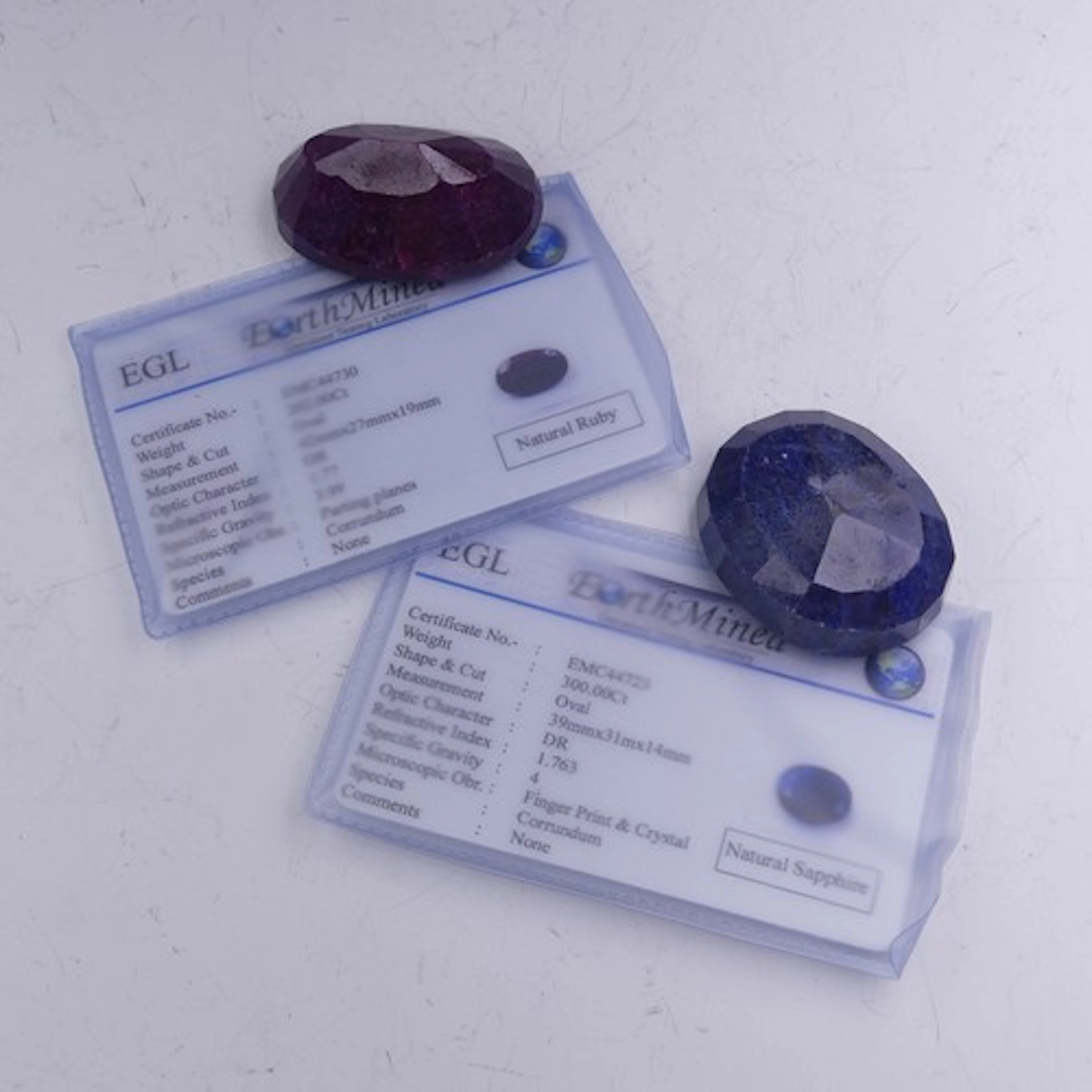 A large oval cut natural Sapphire, 300ct, unmounted, with Ea...
