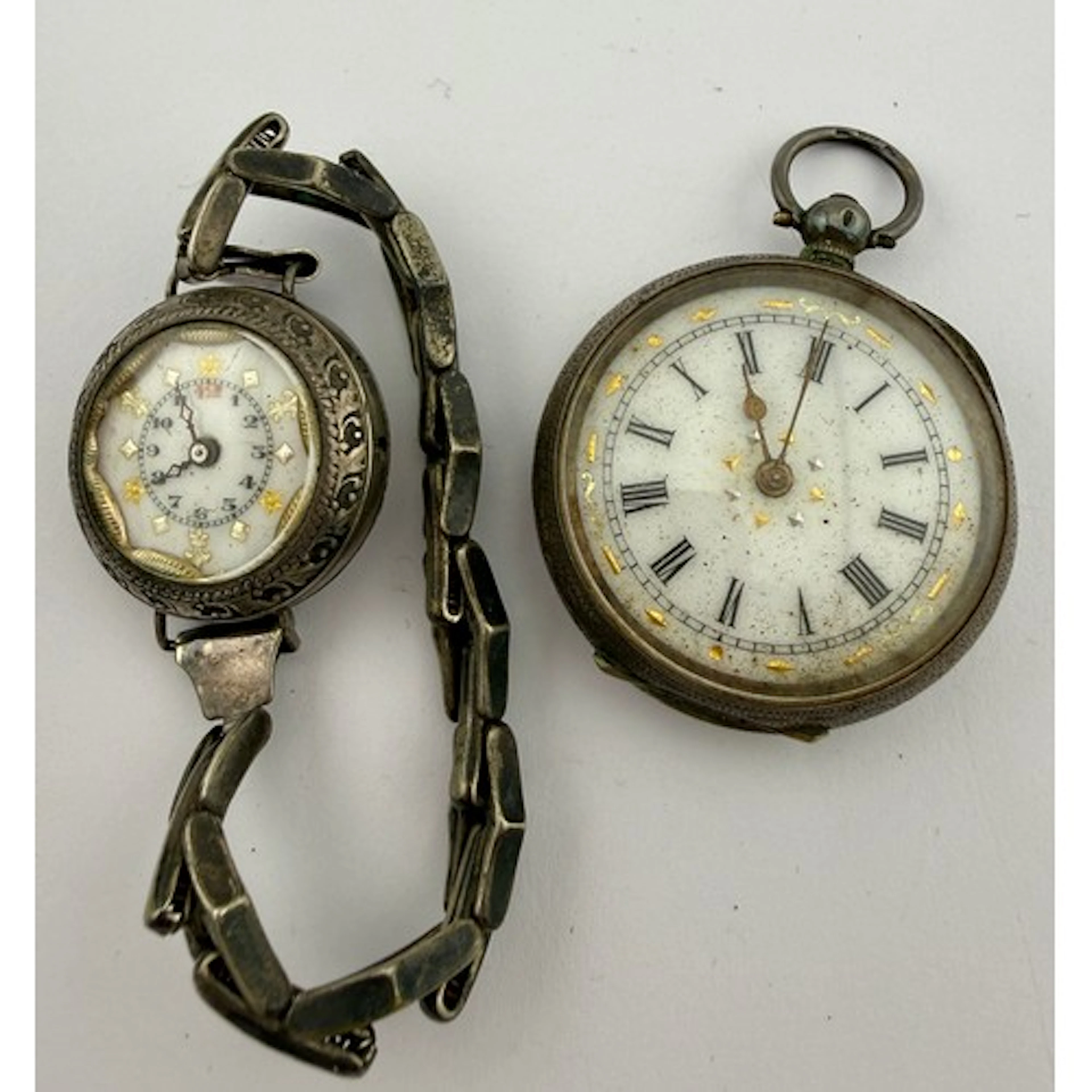 Continental silver pocket watch together with a white metal ...