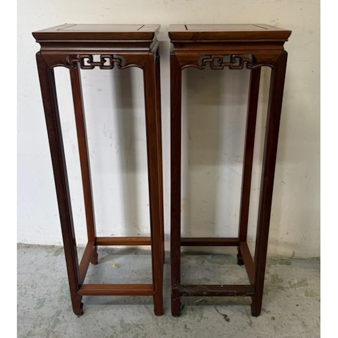 A pair of Chinese hardwood plant stands.