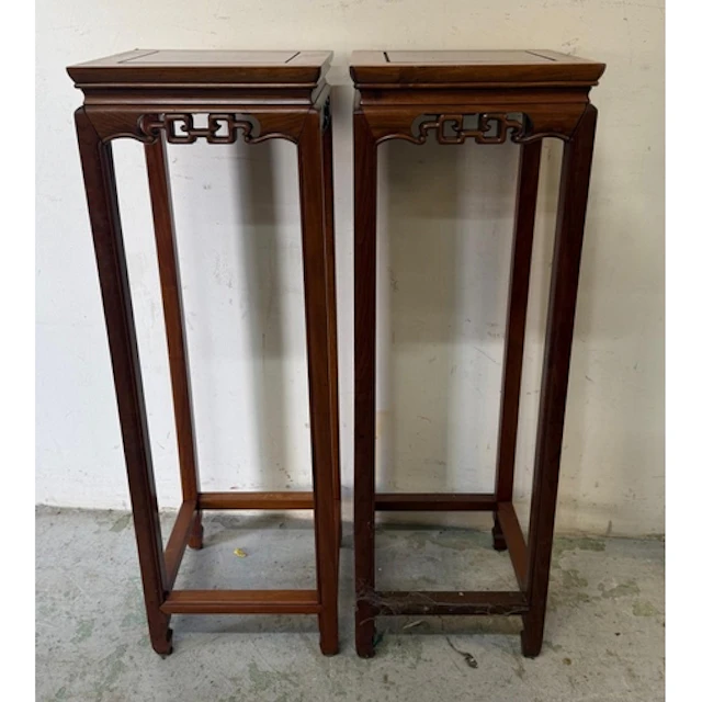 A pair of Chinese hardwood plant stands.